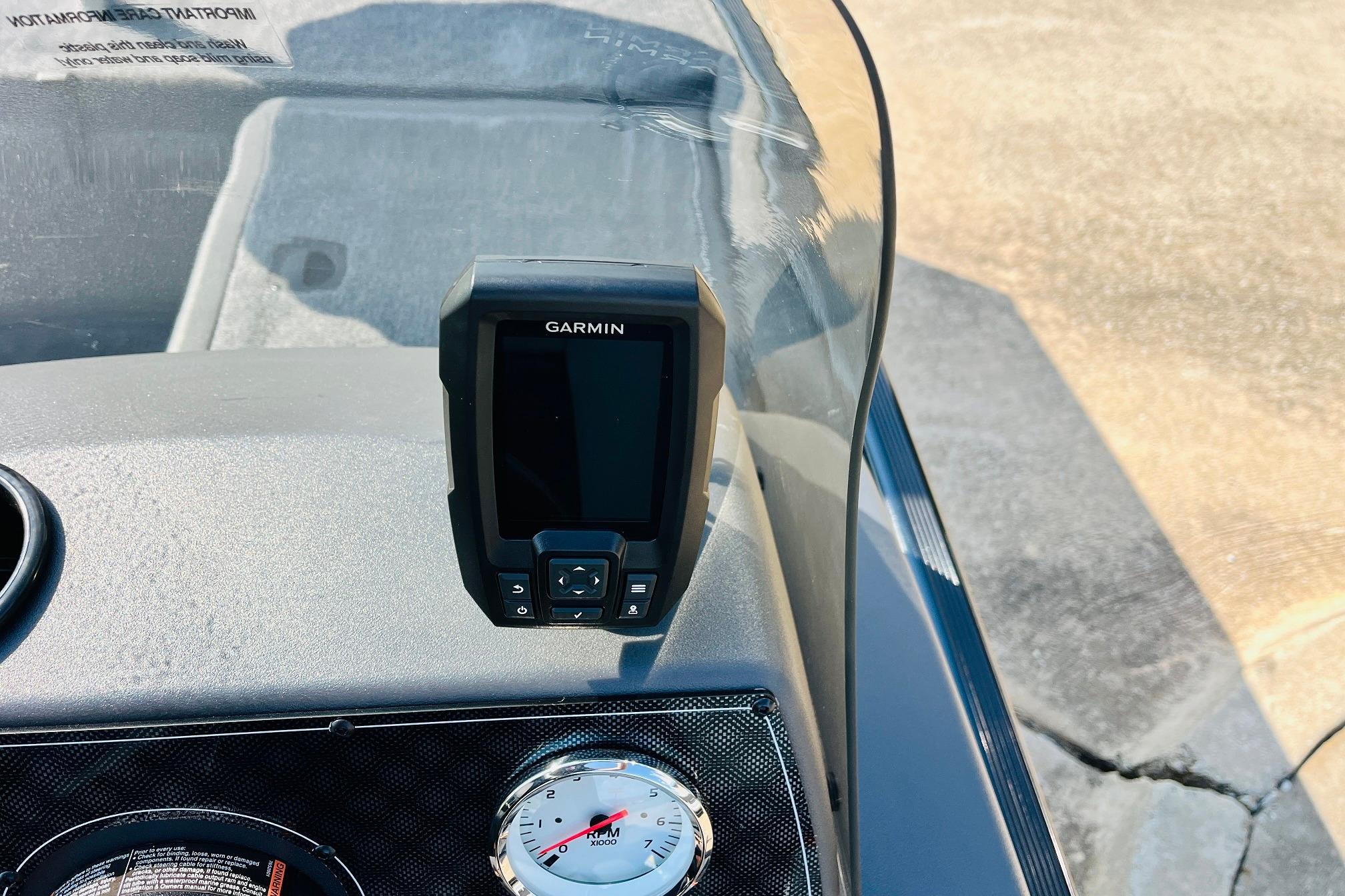 2026 Tracker Bass Tracker Classic XL dashboard with Garmin device and gauge.
