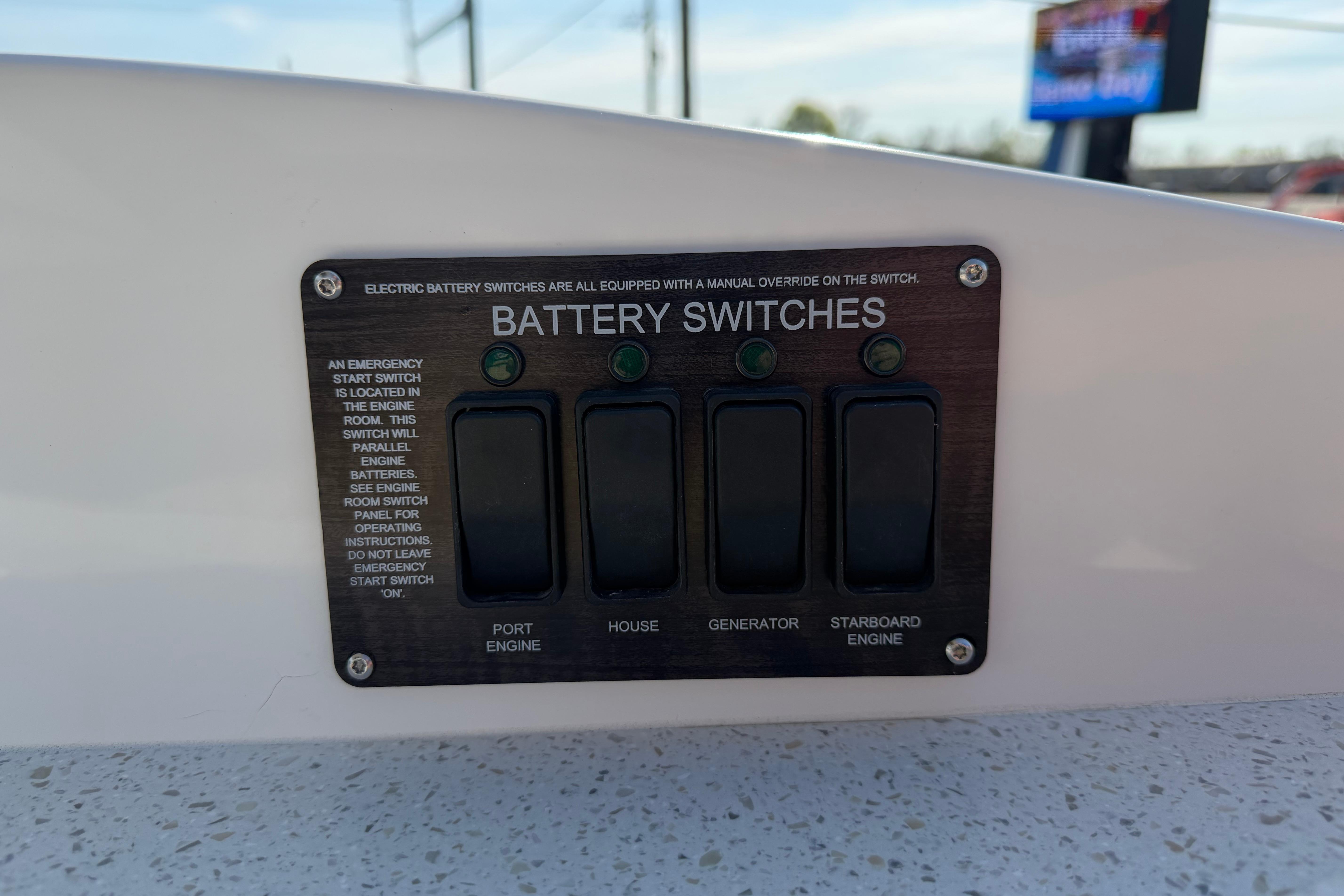 Battery switches panel on 2019 Rinker EX 320 boat, featuring port, house, generator, and starboard controls.