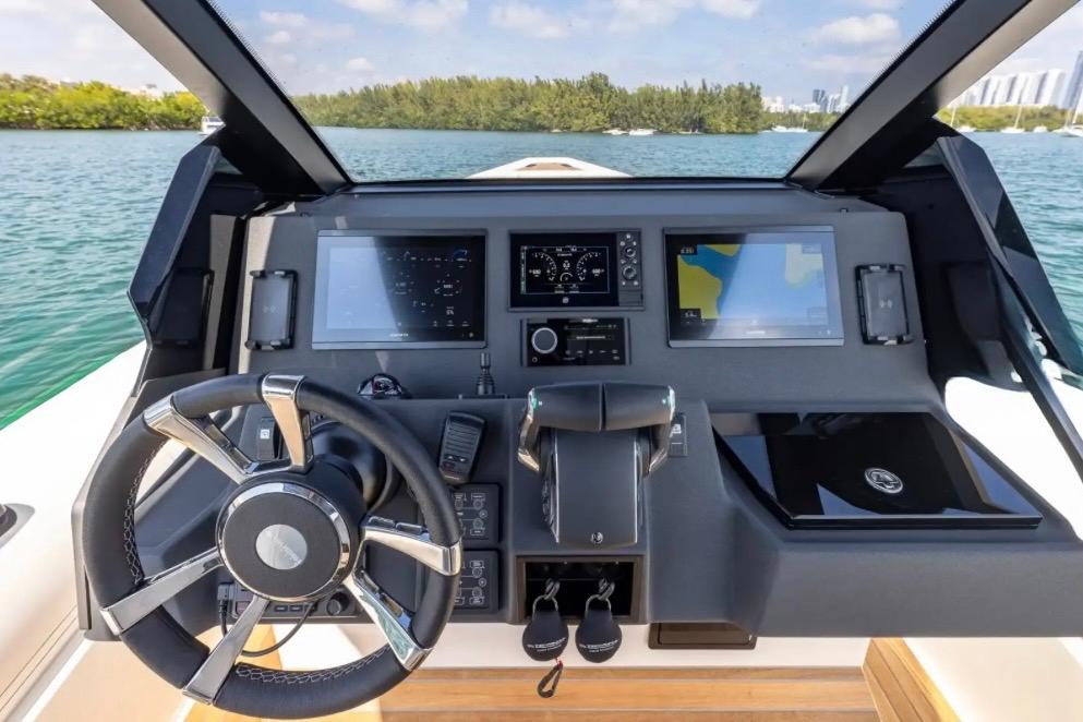 2025 Technohull GTX dashboard with modern navigation and control systems on a sunny day.