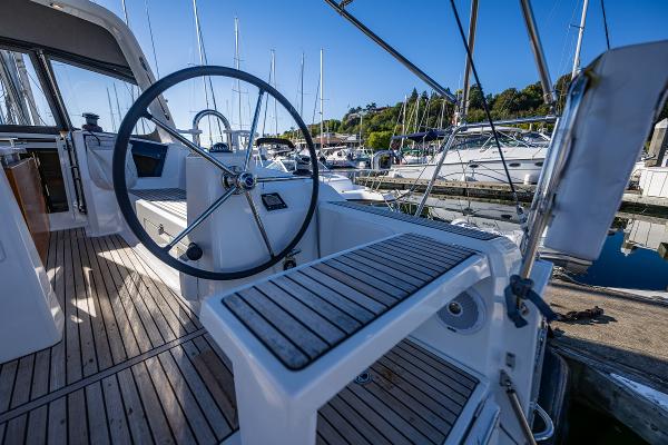Beneteau Oceanis 38.1 yacht cockpit, 2021 model, docked at marina.