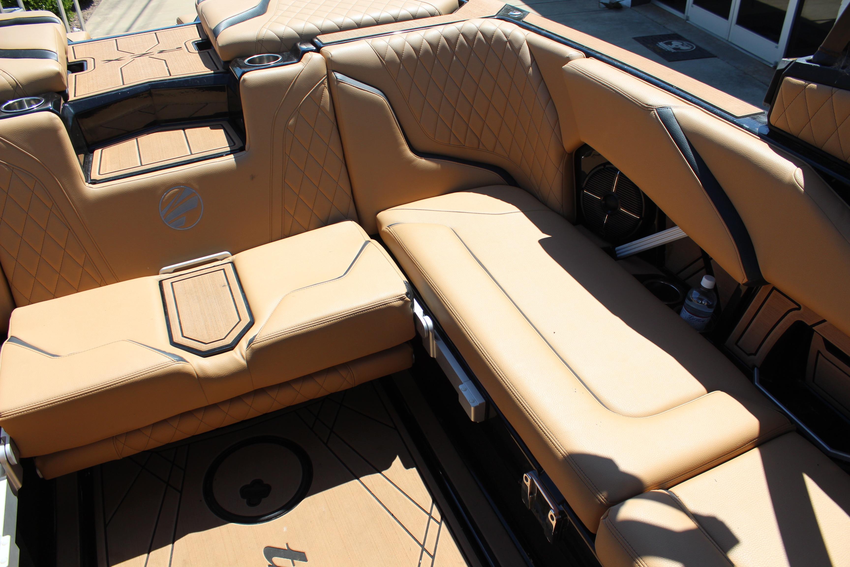 2022 Tigé 22RZX boat interior with tan leather seating and stylish design.