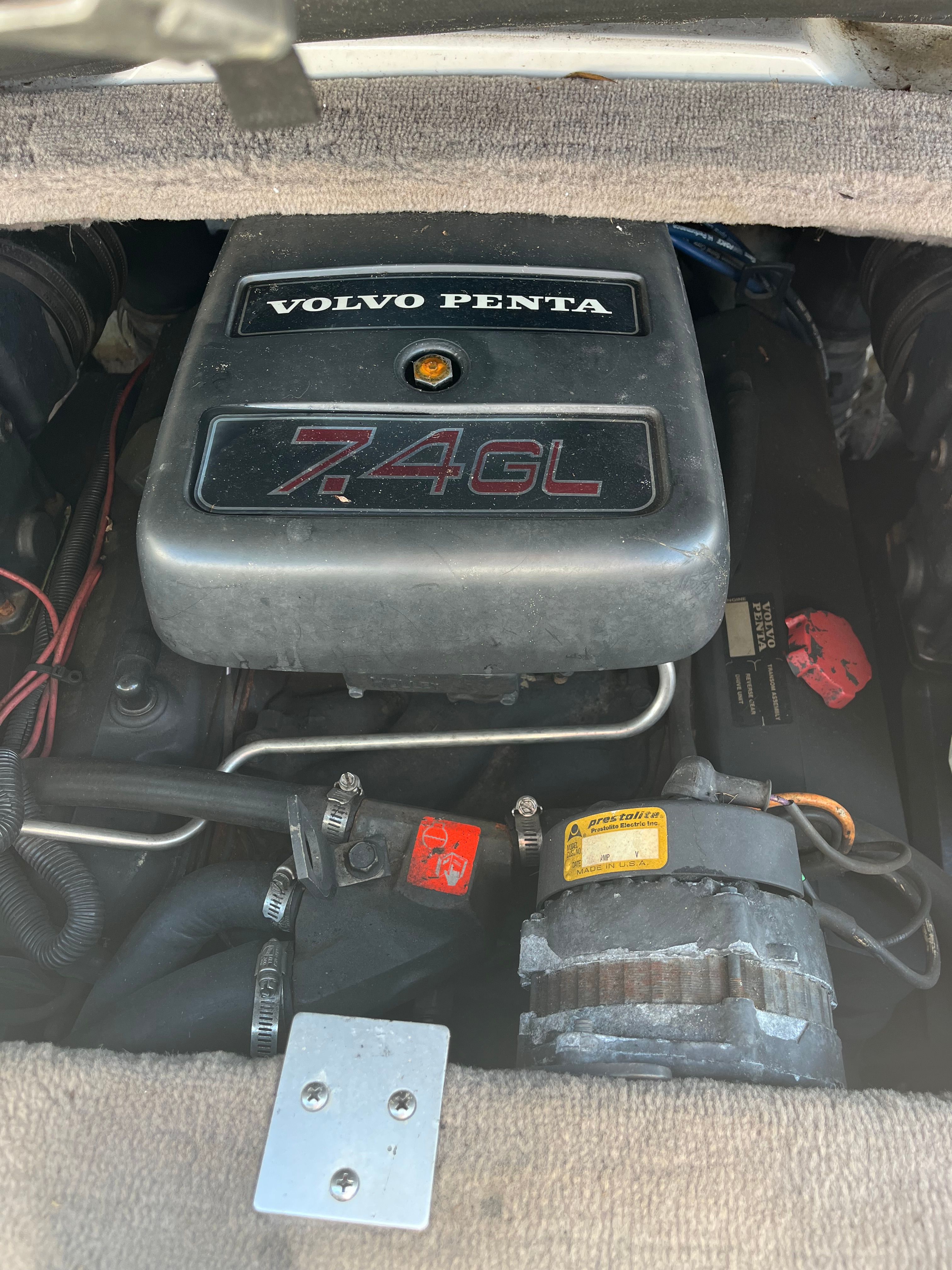 Engine compartment of a 1996 Crownline 202 BR with a Volvo Penta 7.4GL engine.