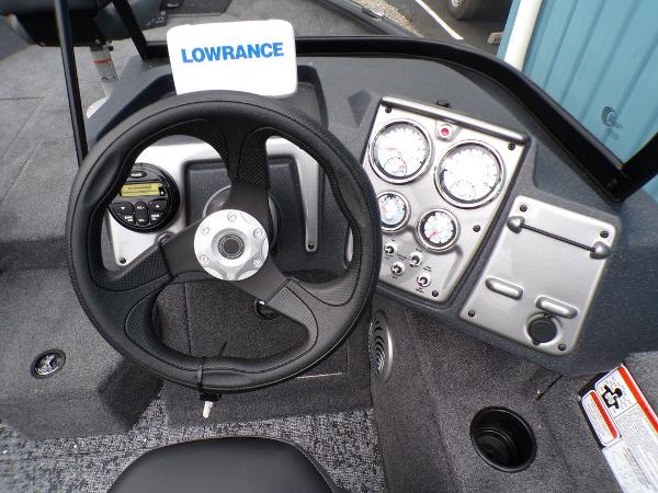 2025 Tracker Pro Guide V-175 Combo dashboard with steering wheel and gauges.
