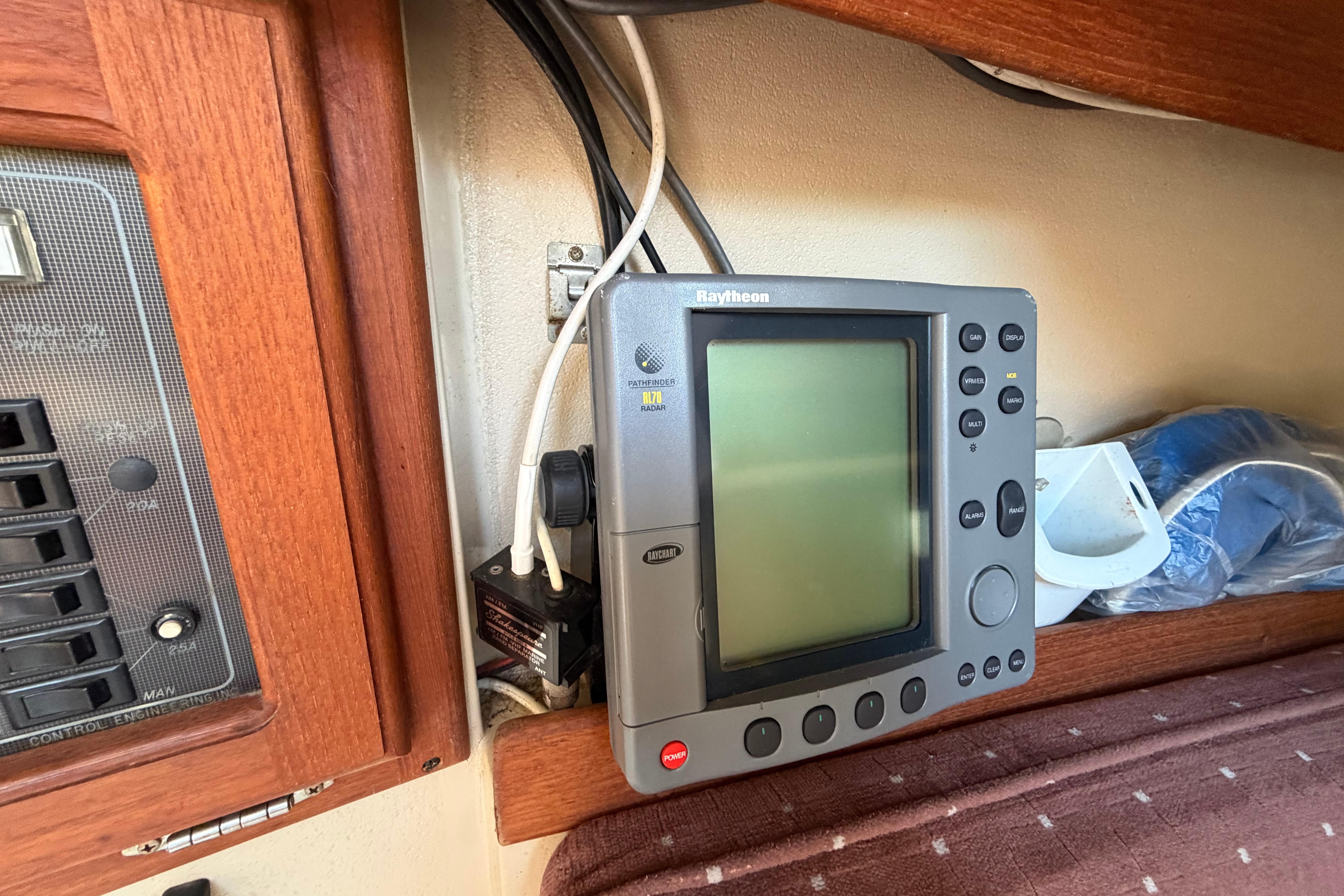 Raytheon marine radar system inside a 1988 Catalina 30 MkII sailboat cabin.