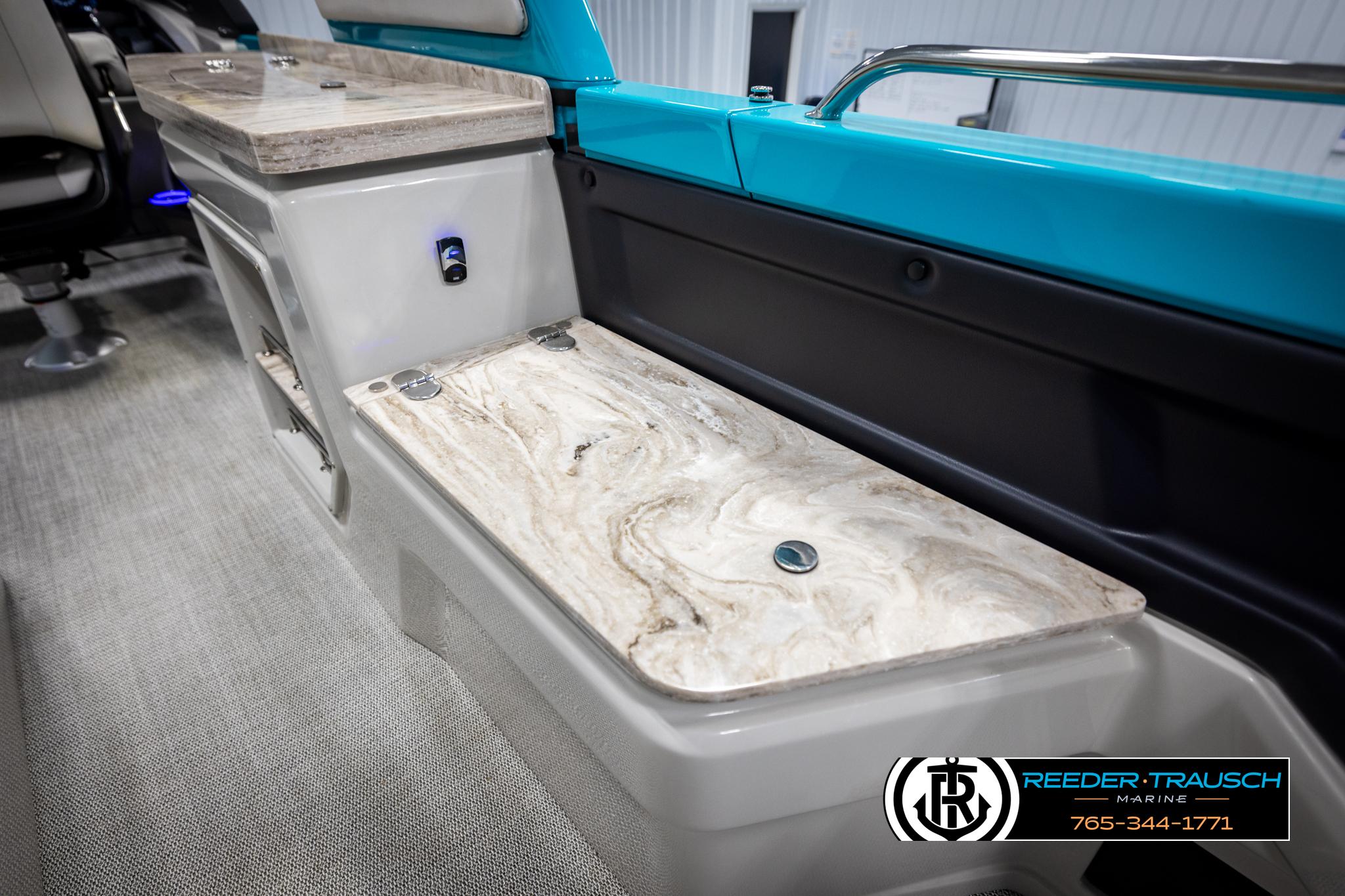Interior of 2025 Avalon 2585 Excal VRBW boat with marble countertop and seating.