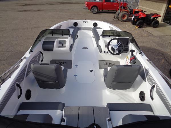 2024 Tahoe T21 boat interior with gray seating and steering console.