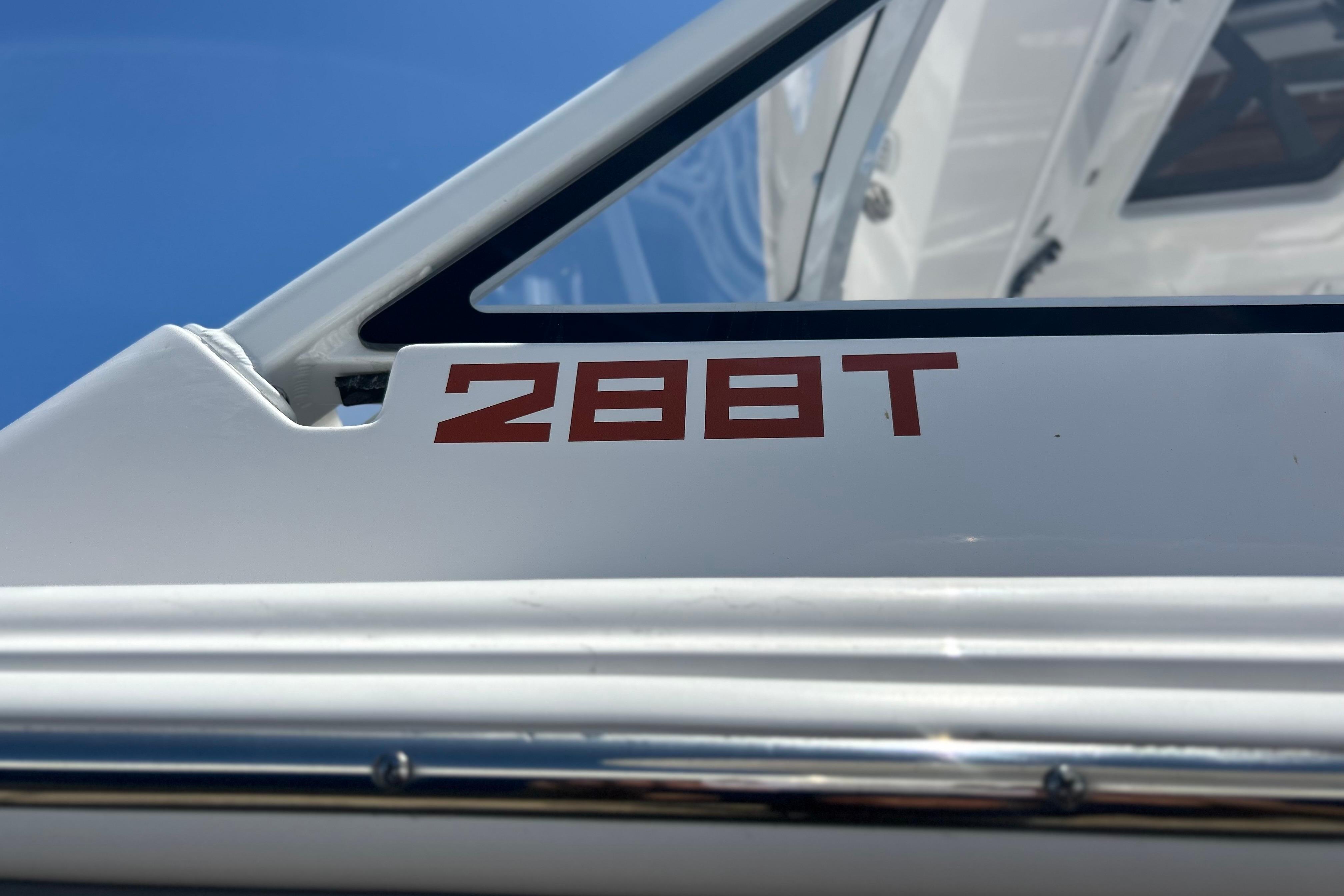 2026 Sea Fox 288 Traveler boat detail with model number on white surface.