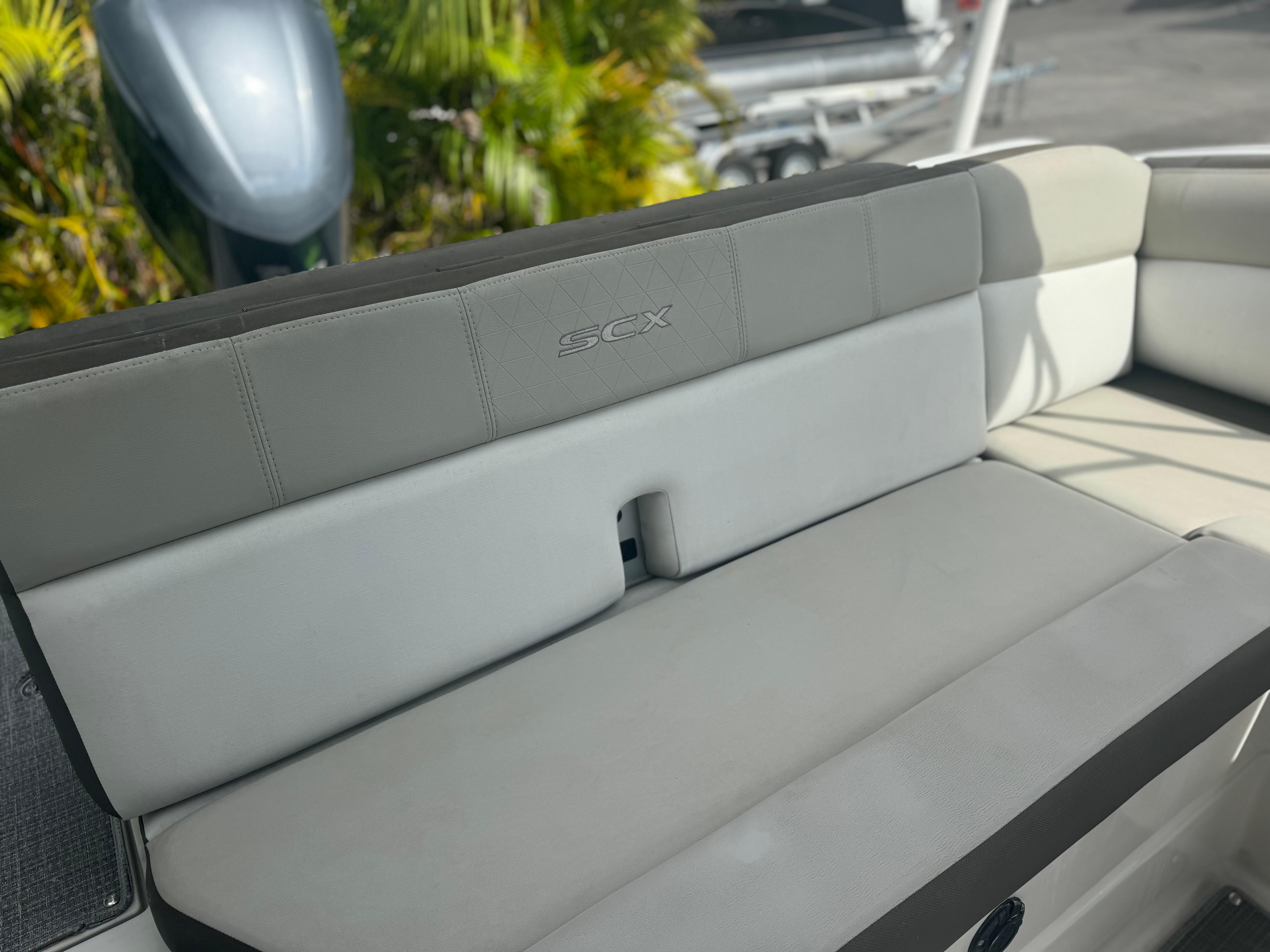 2017 Starcraft 230 OB SCX EXT boat interior seating with gray upholstery.