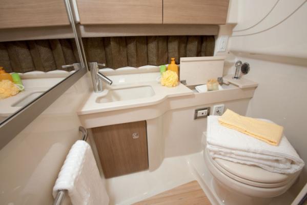 Manufacturer Provided Image: 2013 Formula 350 Sun Sport bathroom with sink, mirror, and toilet.