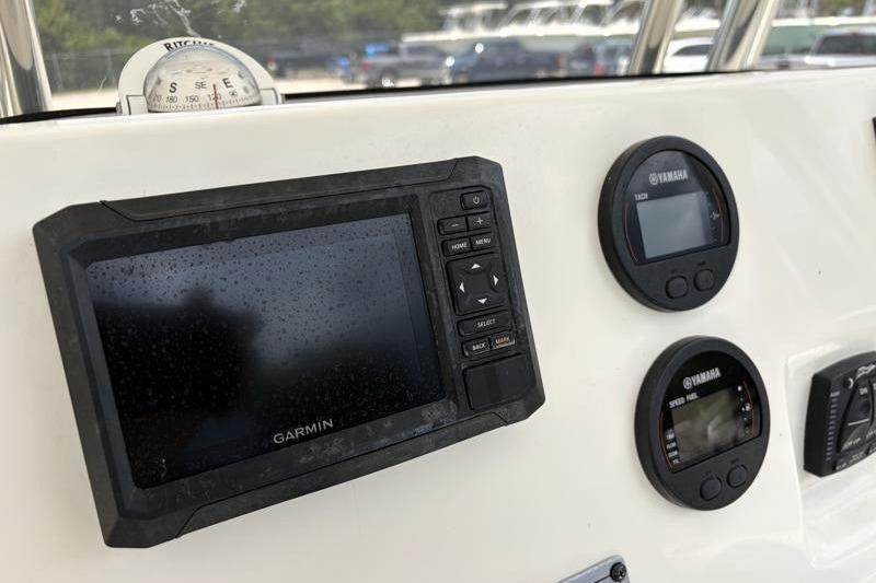 Dashboard of 2023 Key West 203 FS boat with Garmin and Yamaha displays.