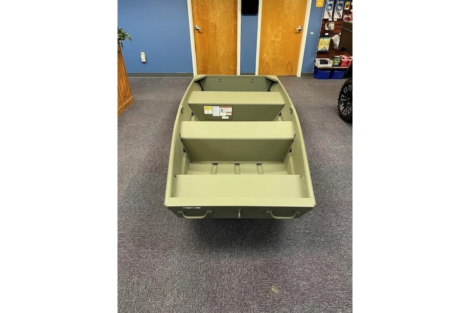 2026 Tracker Grizzly 10 Jon boat displayed indoors on carpeted floor.