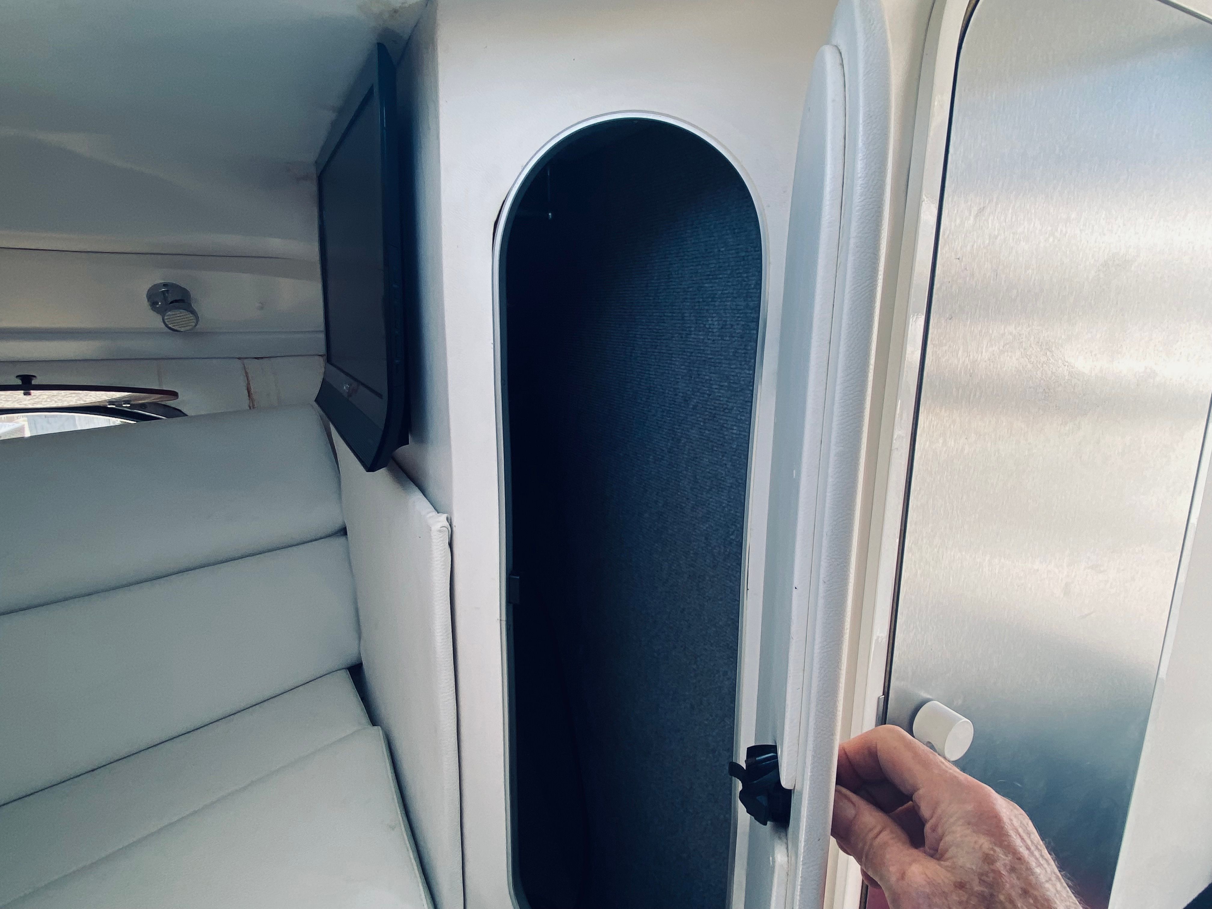 Interior of a 1994 Sunseeker Hawk 31 with storage space.