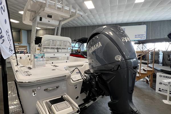 2024 Sea Fox 231 Bay boat with Yamaha 200 outboard motor in showroom.