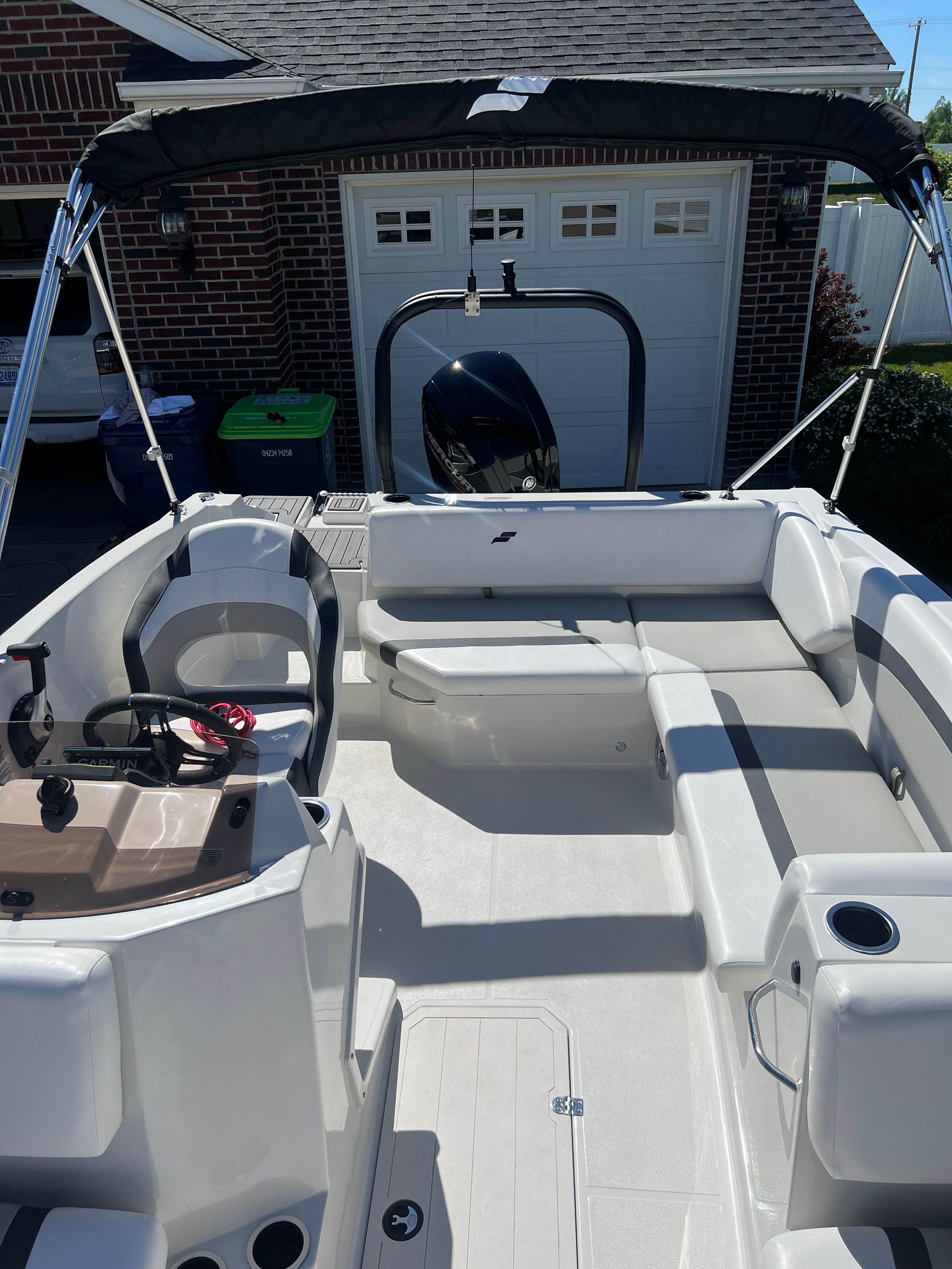 Interior view of a 2023 Starcraft SVX 171 OB boat at dock.