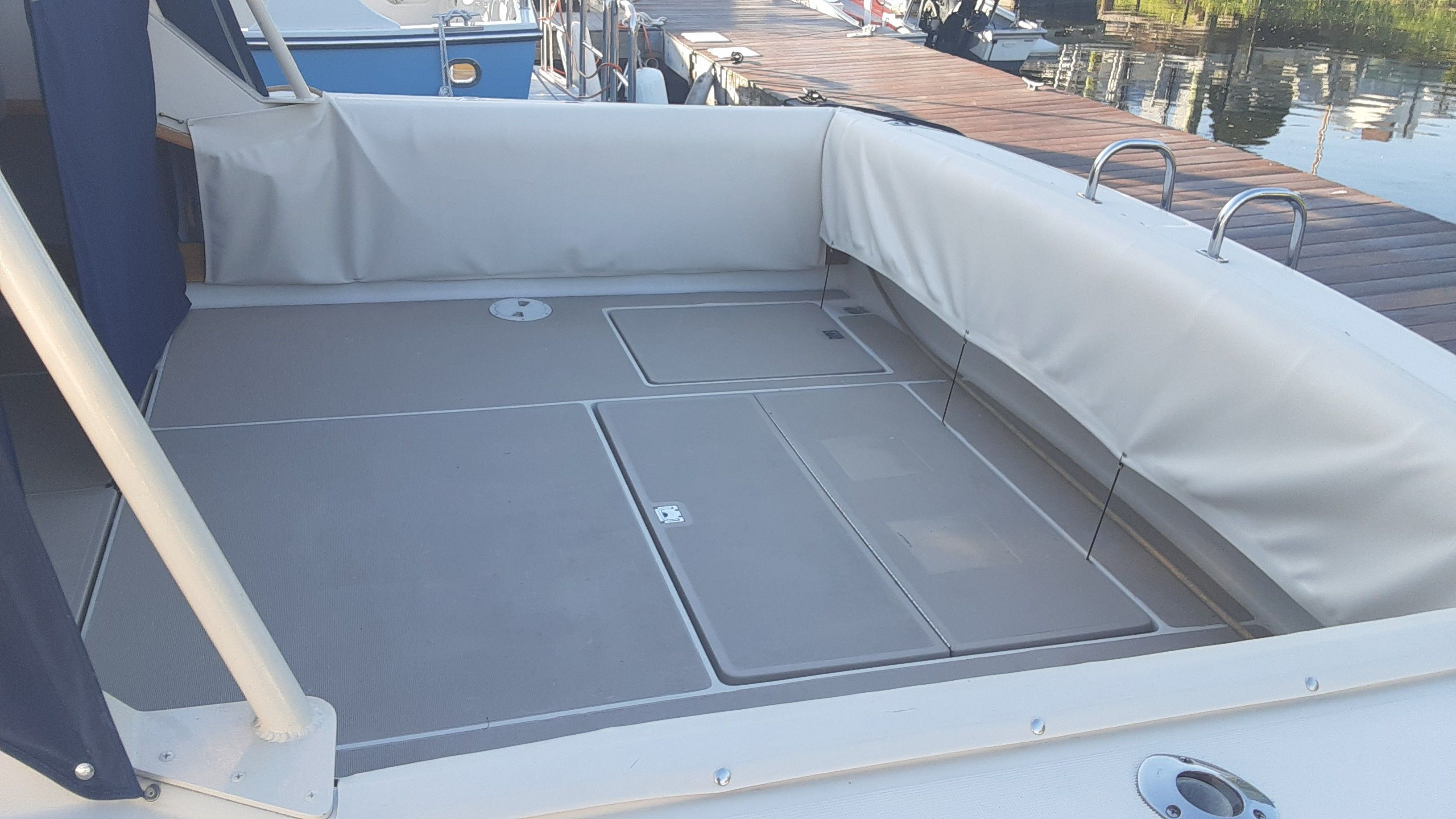 1985 Tiara Yachts 3100 Open docked at marina.
