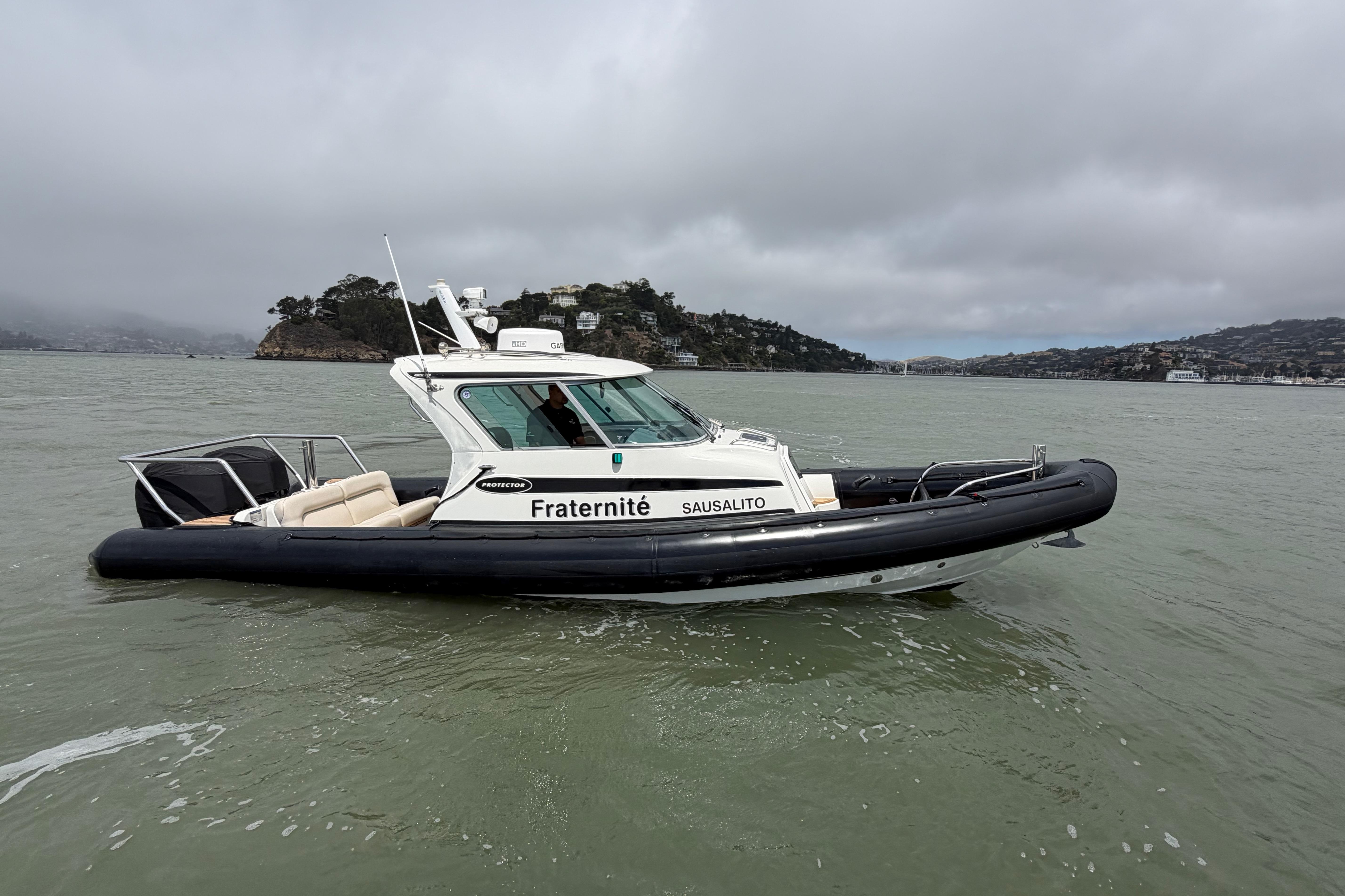 2016 Protector Targa 30 boat named "Fraternité" on water near Sausalito.