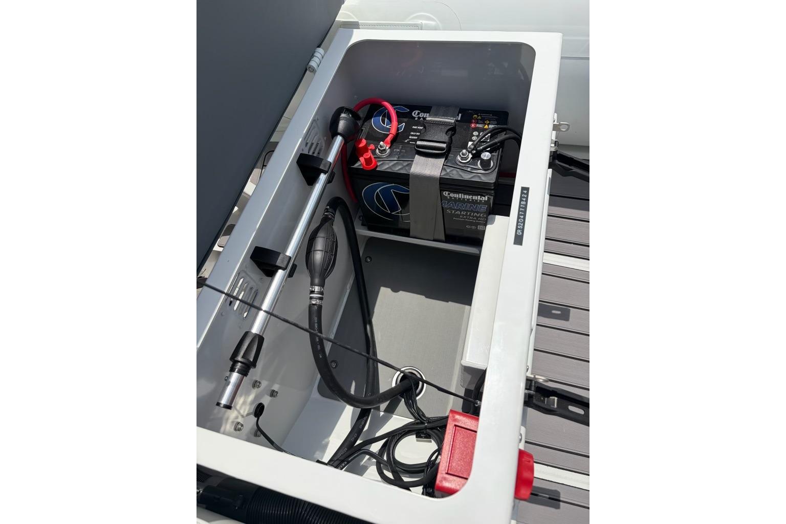 Interior view of 2026 Highfield Classic 360 boat showing battery compartment and equipment.