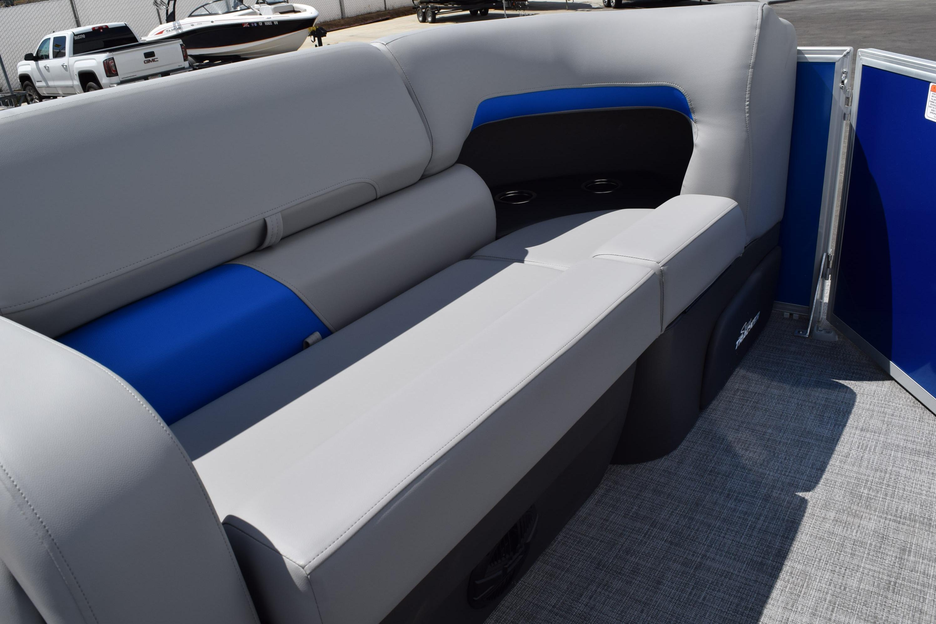 2026 Sun Tracker Party Barge 22 RF XP3 interior seating with gray and blue upholstery.