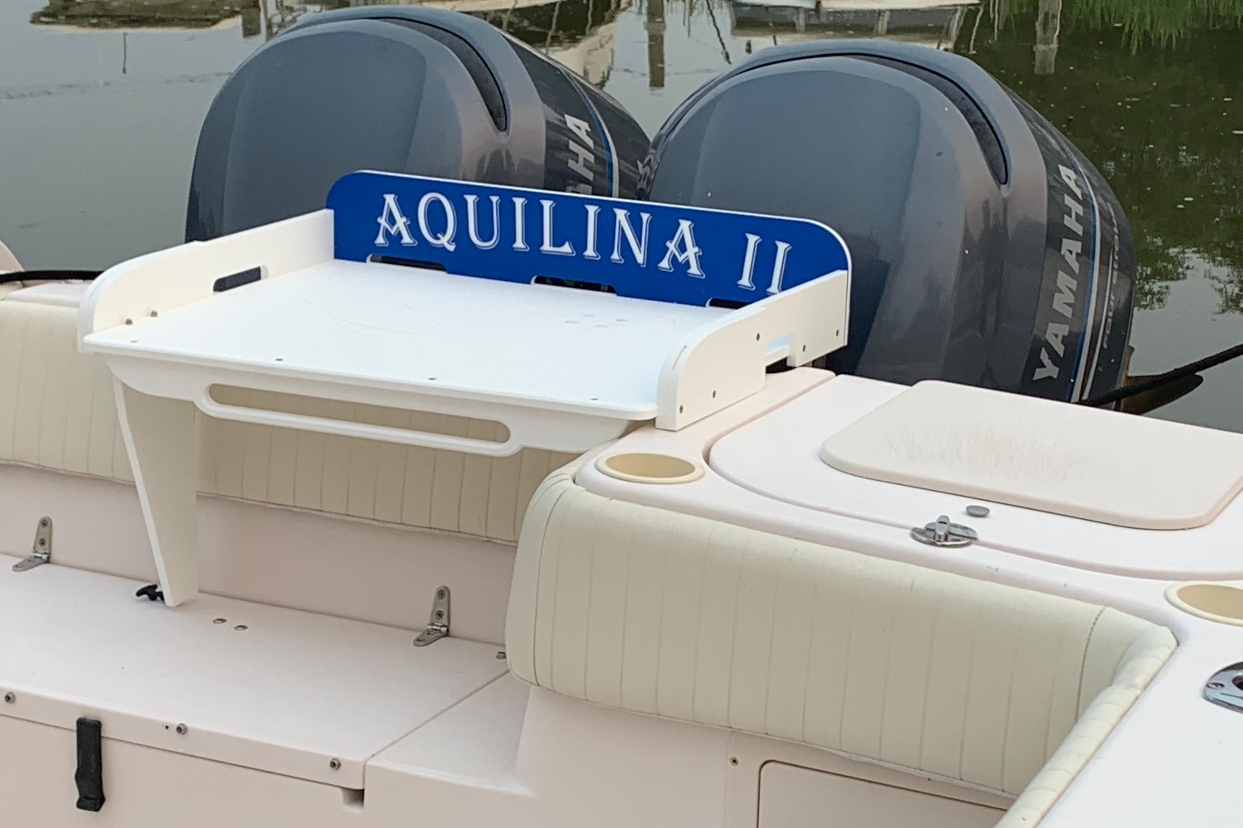 2004 Grady-White Sailfish 282 boat with Yamaha engines, featuring "Aquilina II" nameplate.
