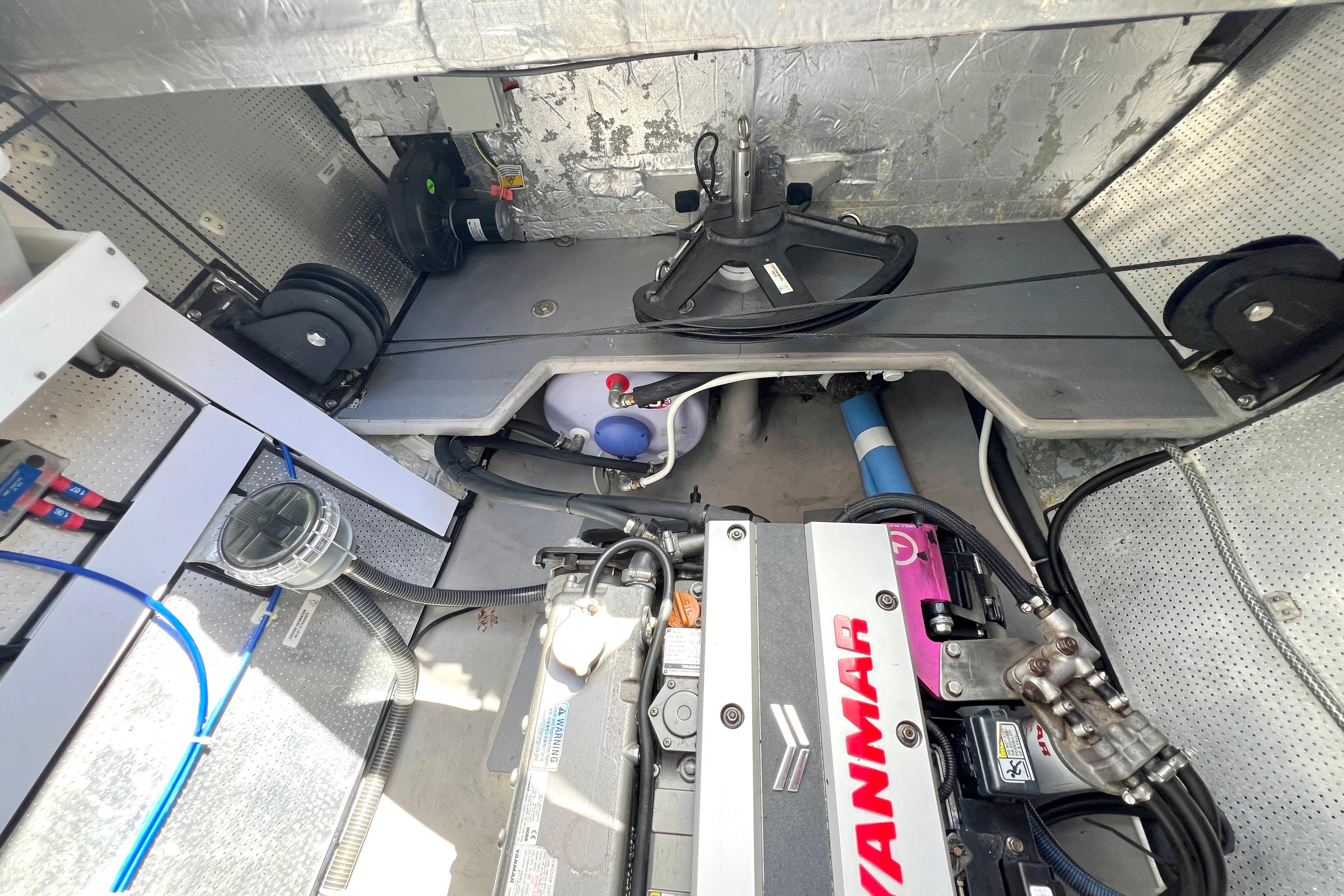Engine compartment of a 2021 Balance 482 with Yanmar engine and mechanical components.