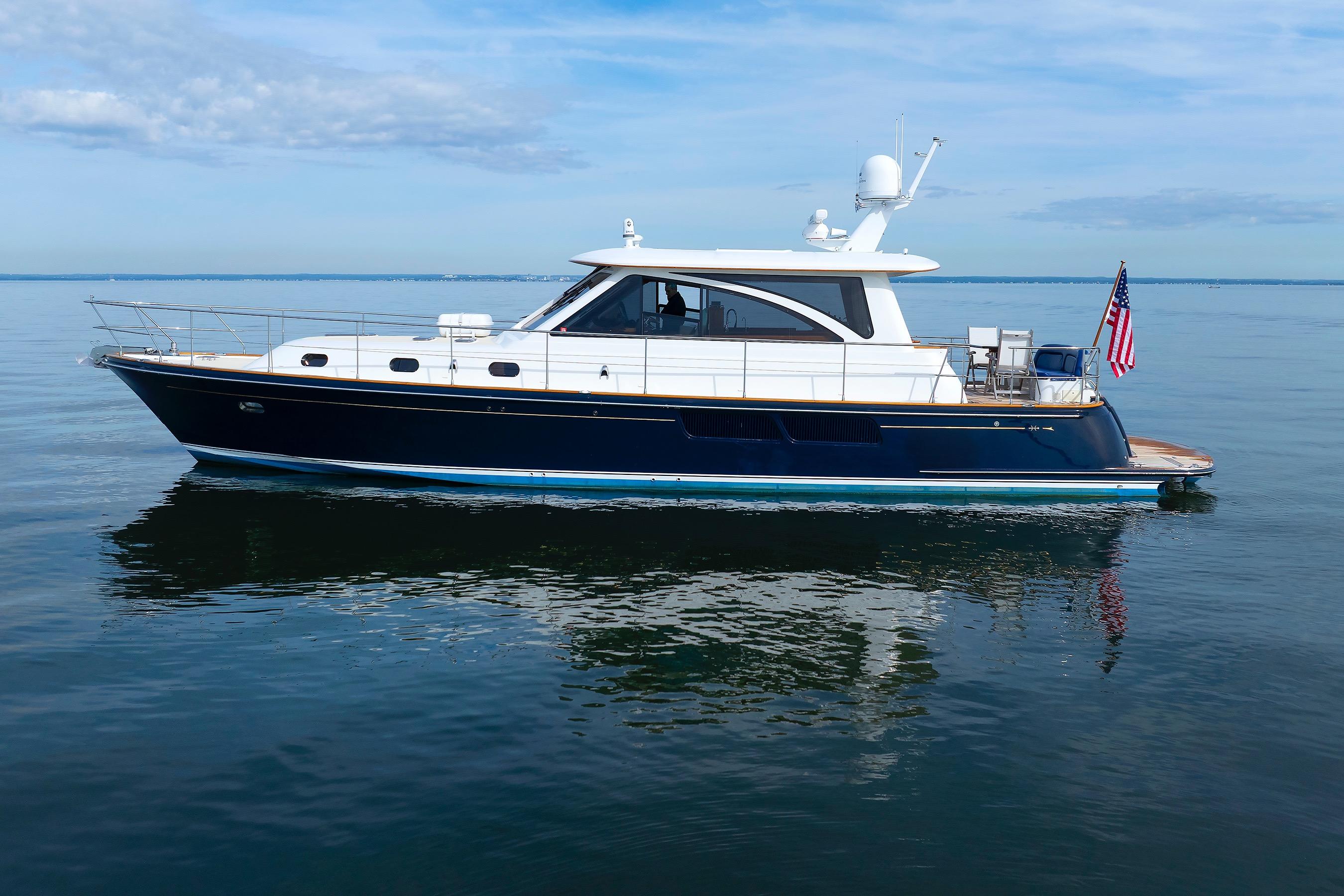2009 Hunt Yachts 52 Express cruising on calm waters under a clear sky.