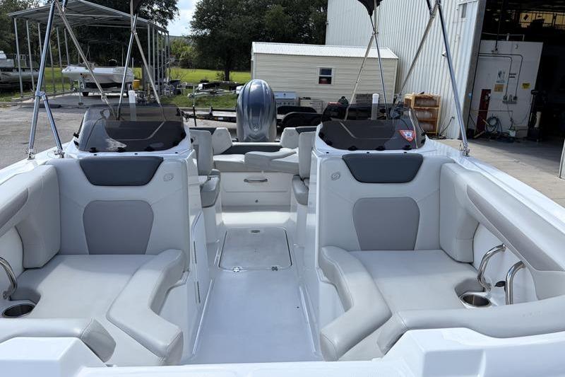 2026 Hurricane SunDeck Sport 2050 OB boat interior with spacious seating and modern design.