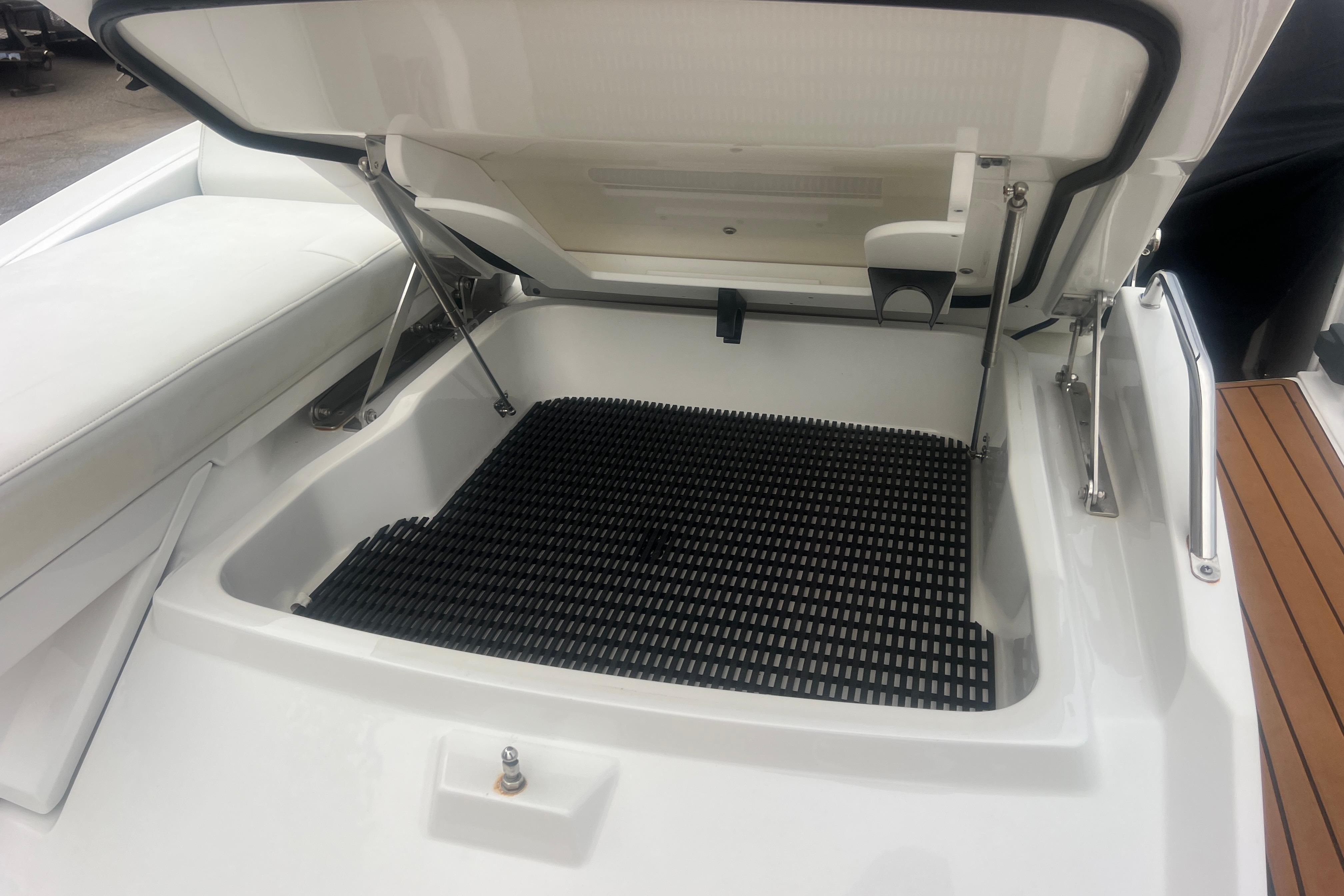 Open storage compartment on a 2017 Monterey 298SS Super Sport boat.