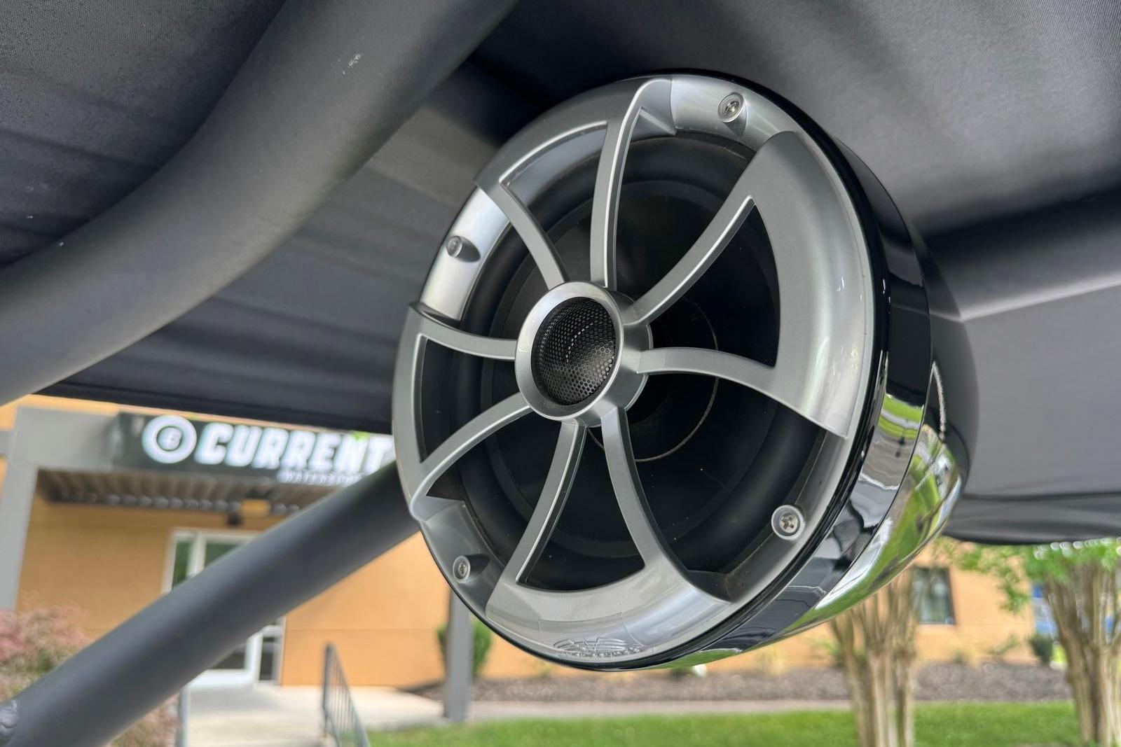 2023 Yamaha Boats 252XE speaker detail, showcasing sleek design and modern audio technology.