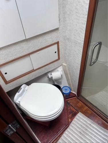 1986 Egg Harbor 60 Sportfisherman bathroom with toilet and shower.