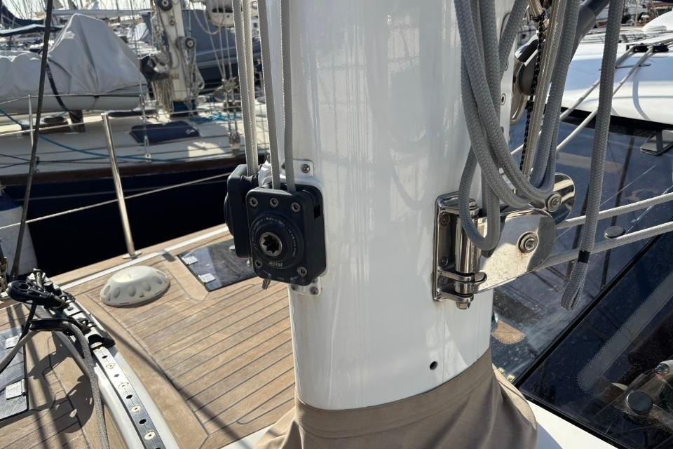 Sailboat mast with rigging and hardware on a 2021 Discovery 58 yacht.
