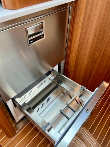 Stainless steel drawer in 2025 Sabre 43 Salon Express yacht interior.