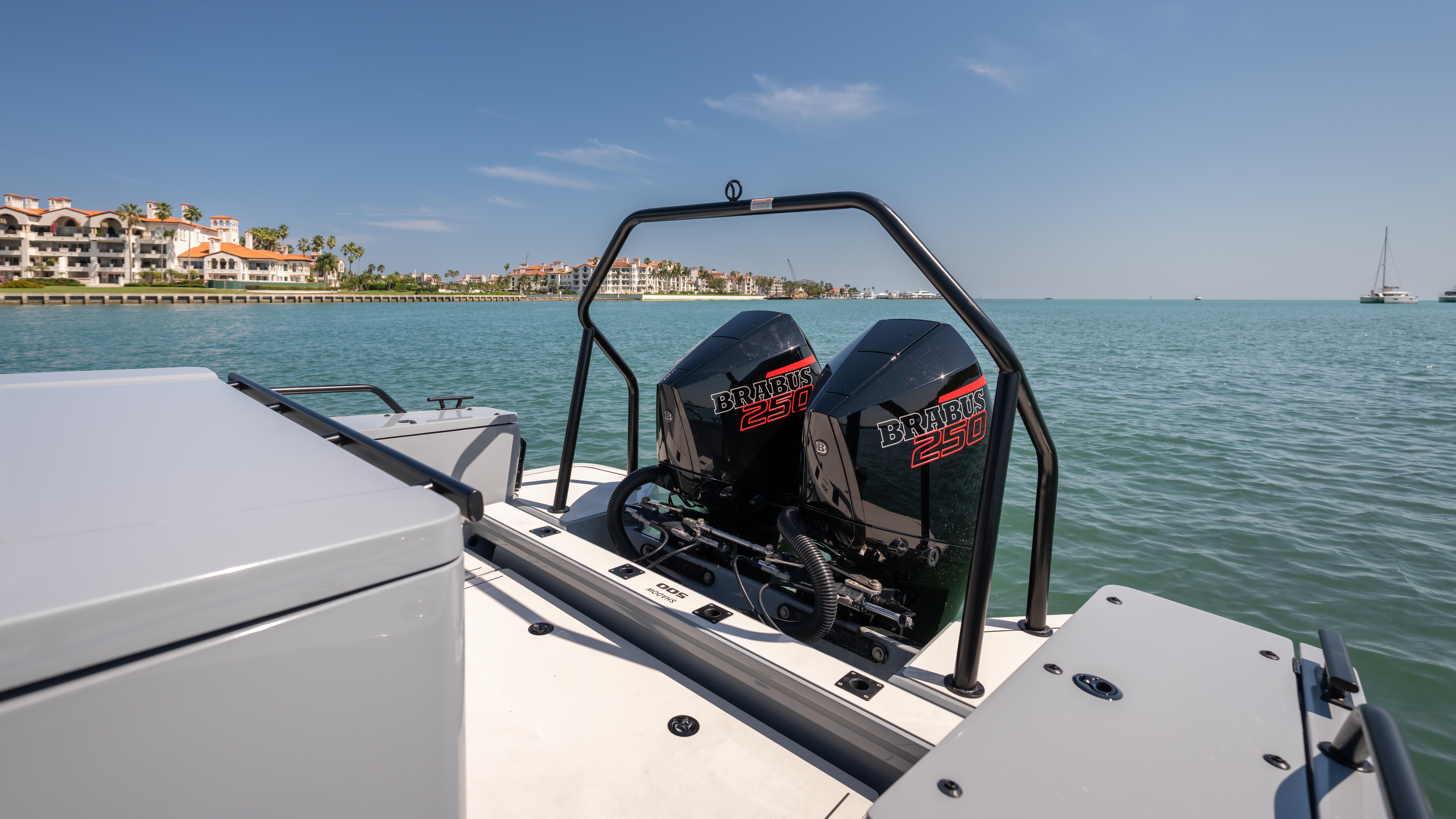 2023 BRABUS Shadow 500 T-Top boat with dual engines on a sunny day.
