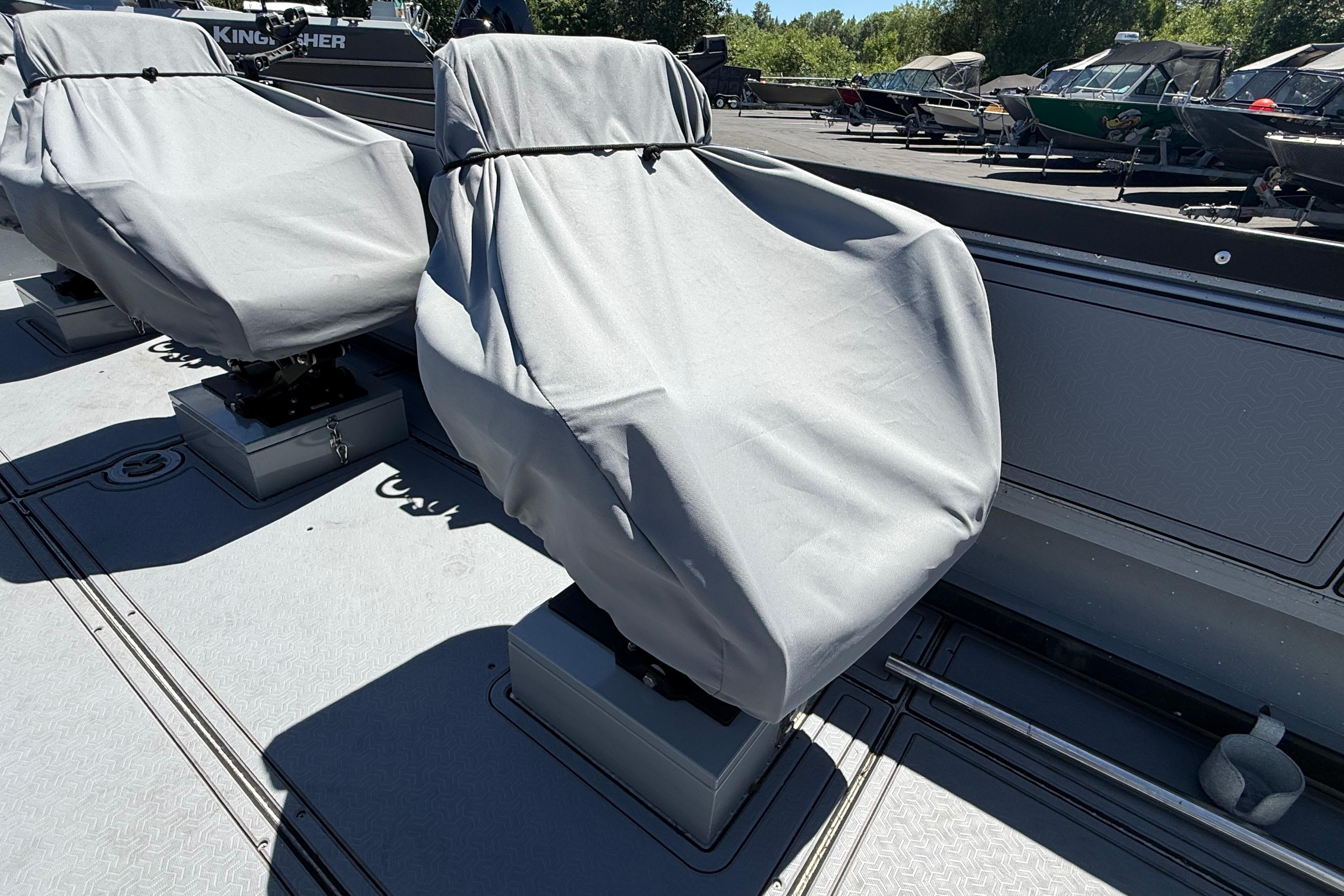 Covered seats on a 2015 Alumaweld Pacific XD 28 boat deck.