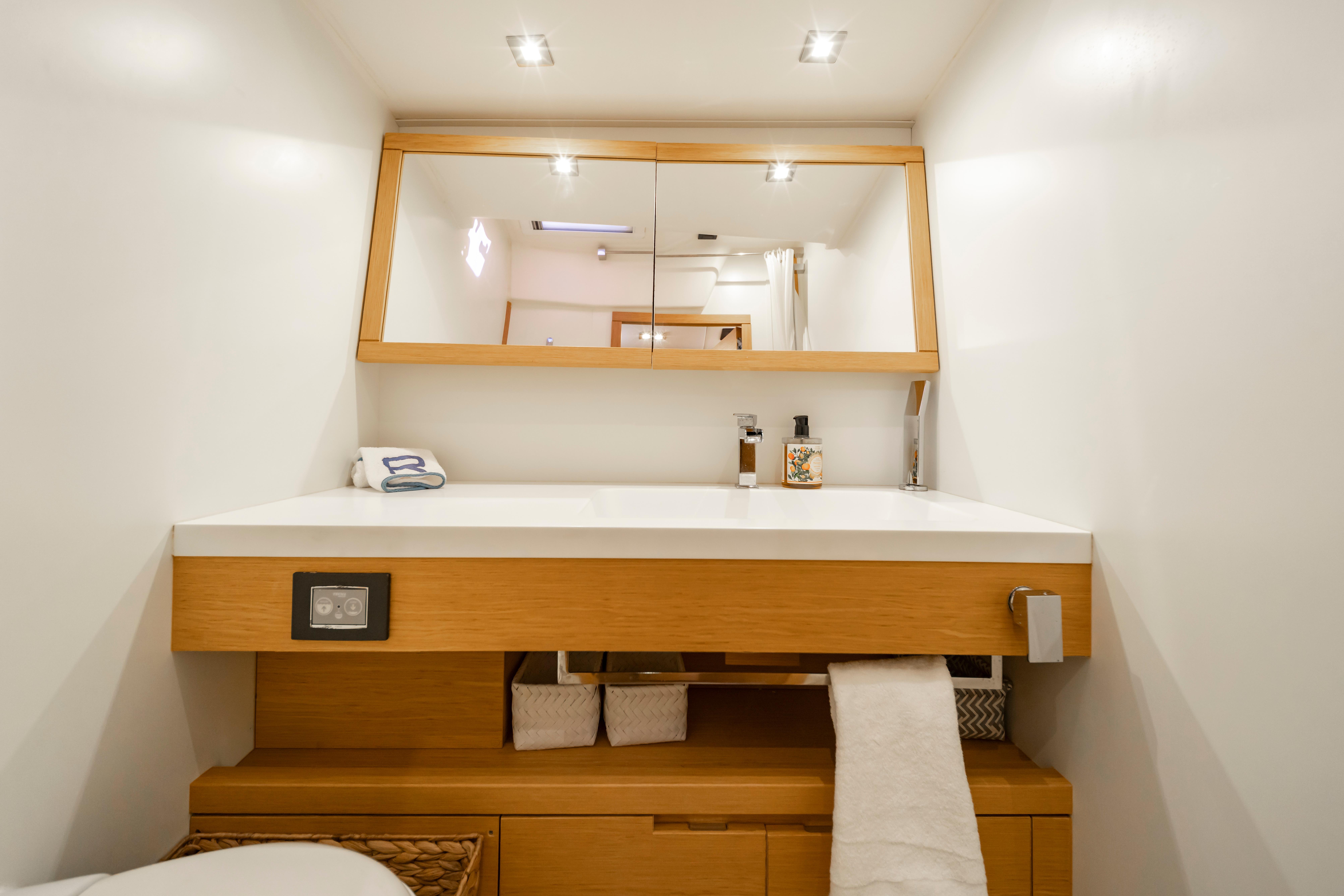 Modern bathroom vanity on 2016 Grand Soleil 58 yacht, featuring sleek design and ample storage.