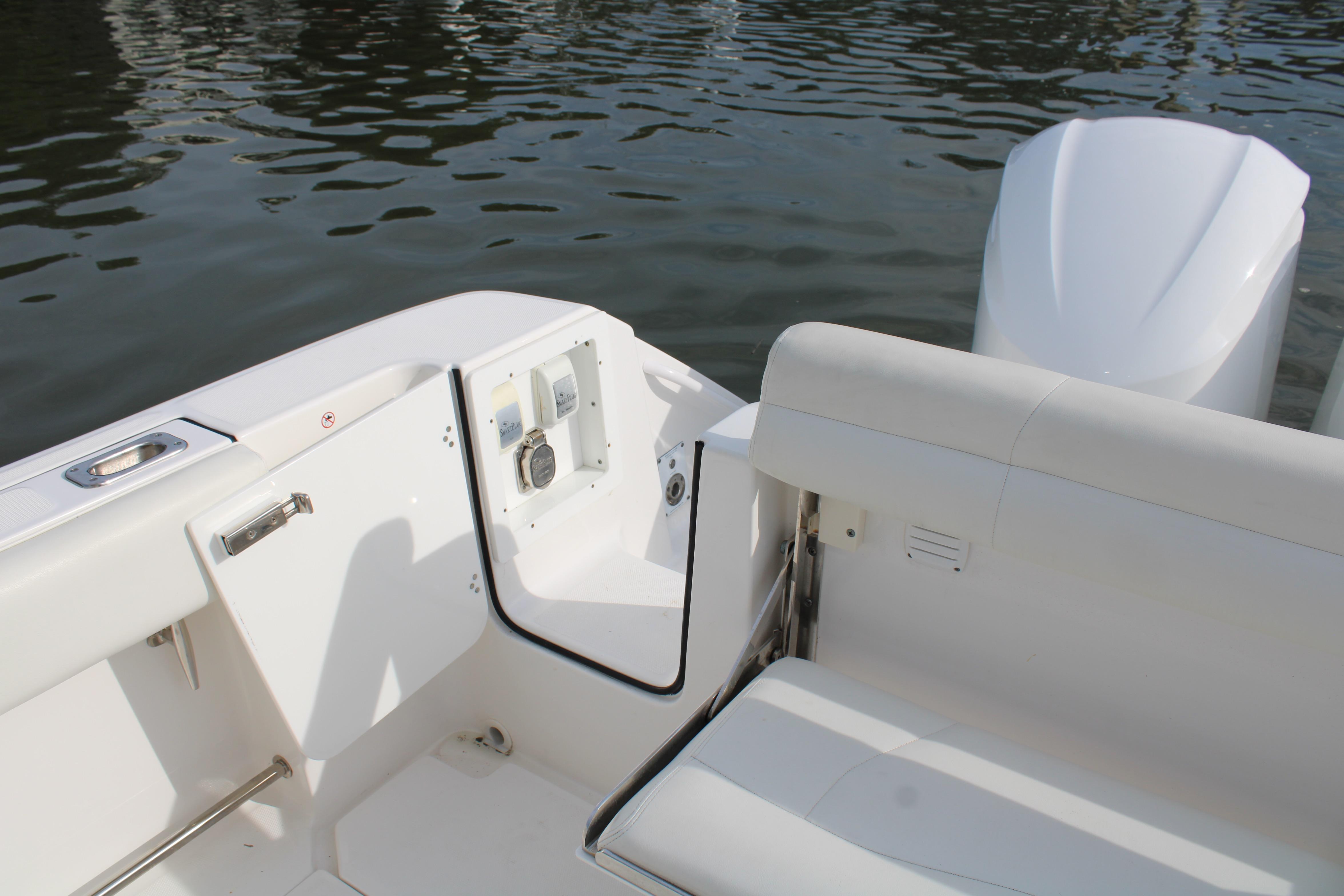 2022 Edgewater 280CC boat interior with seating and water view.