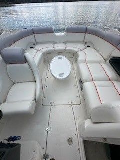 Interior of a 2008 Yamaha AR230 boat with white seating.