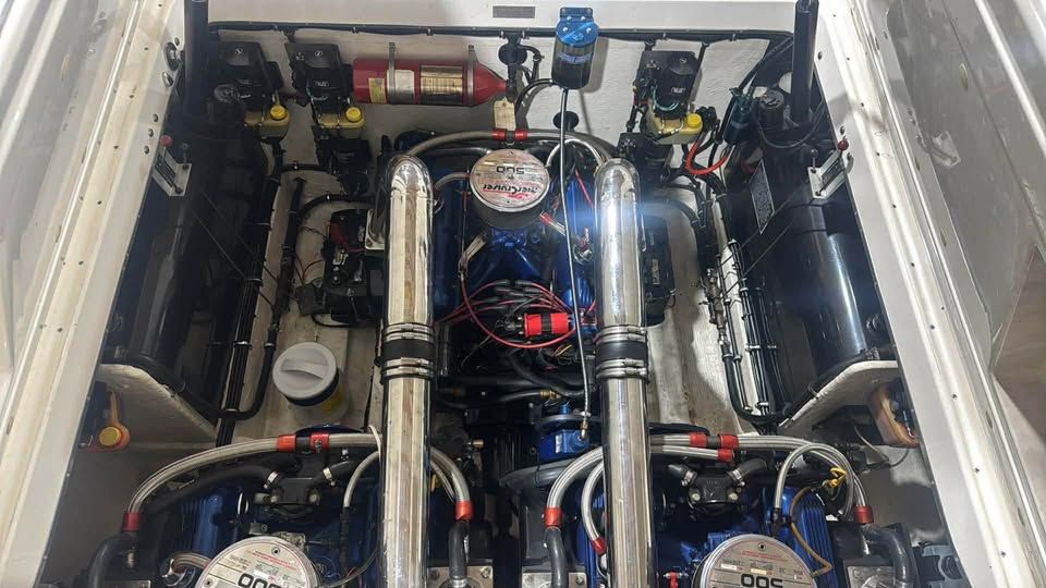 Engine compartment of a 1996 Fountain 42Ft boat with dual engines.