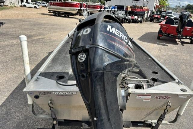 2015 Tracker Panfish 16 boat with Mercury 40 HP outboard motor in a dealership lot.