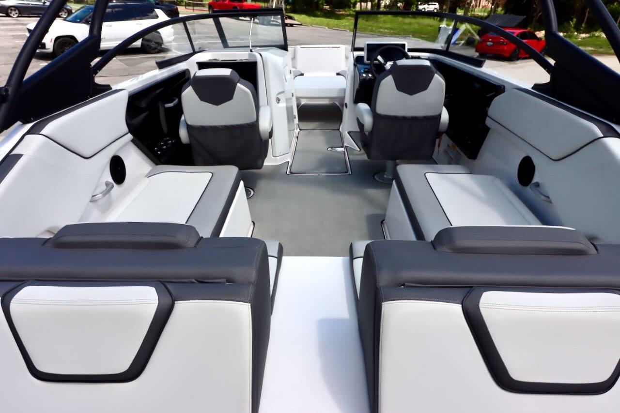 2023 Yamaha Boats AR250 interior with modern seating and sleek design.