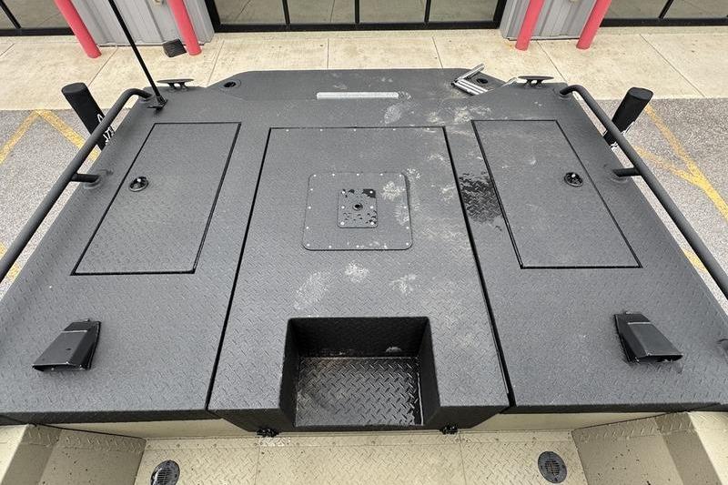 2026 SeaArk Predator 300 AK boat deck with storage compartments and non-slip surface.