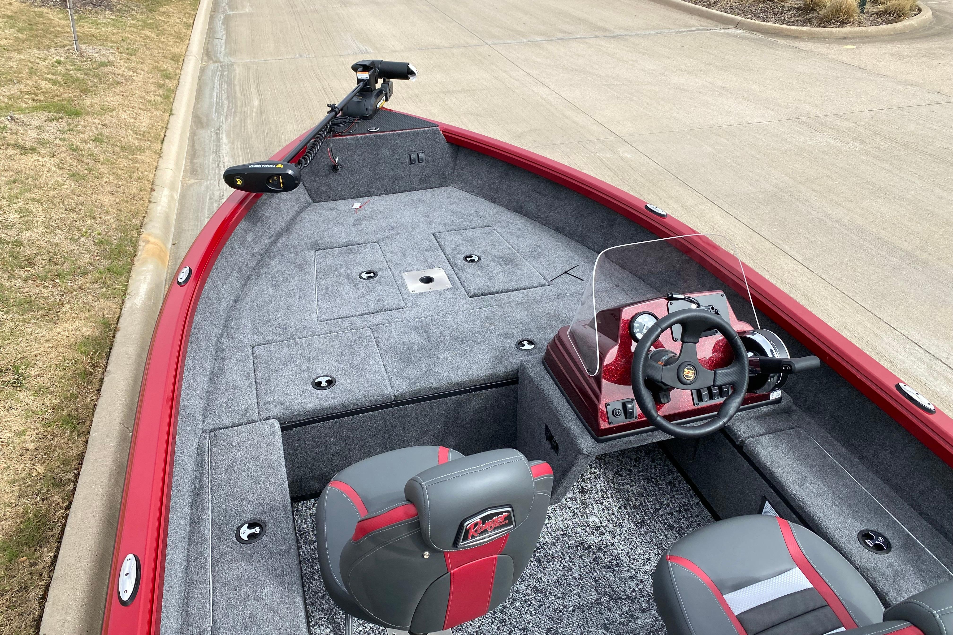 2026 Ranger VS1665SC boat interior with red accents and steering console.