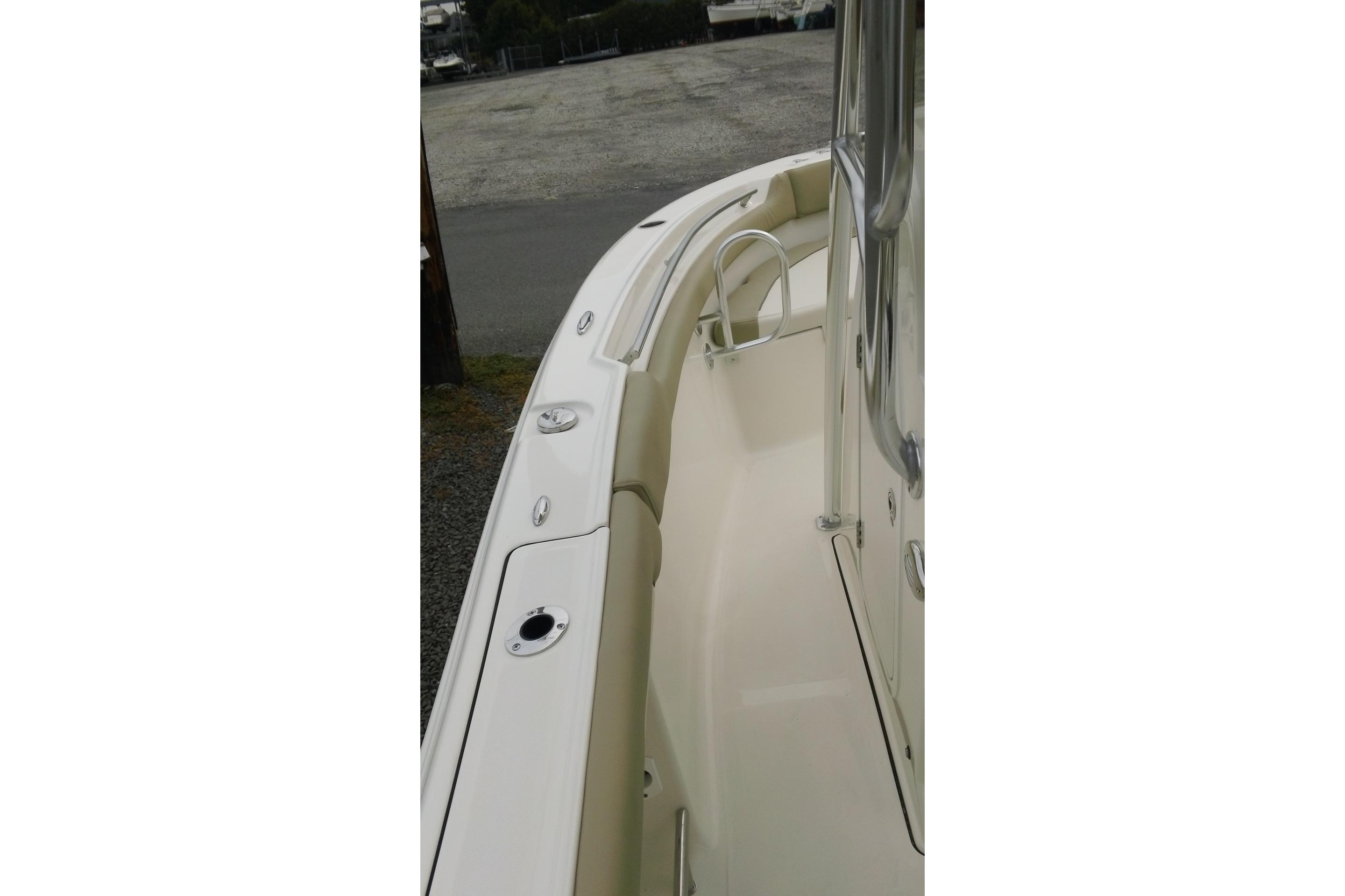 2026 Pioneer 202 Islander boat deck with sleek design and stainless steel fittings.