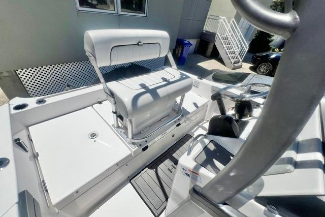 2019 Yamaha Boats 190 FSH Sport interior with seating and control area.
