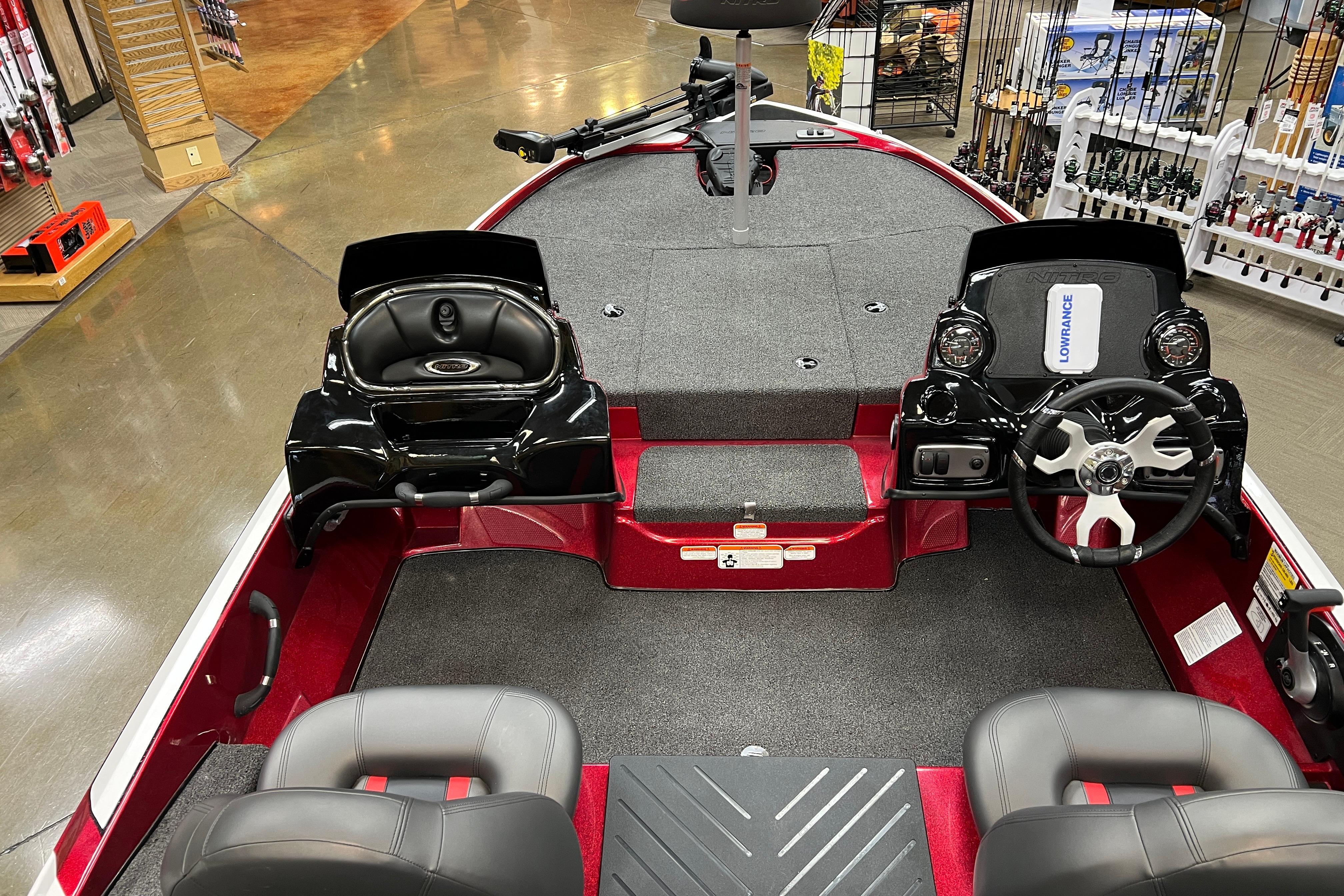 Interior view of a 2026 Nitro Z17 boat with dual consoles and steering wheel.