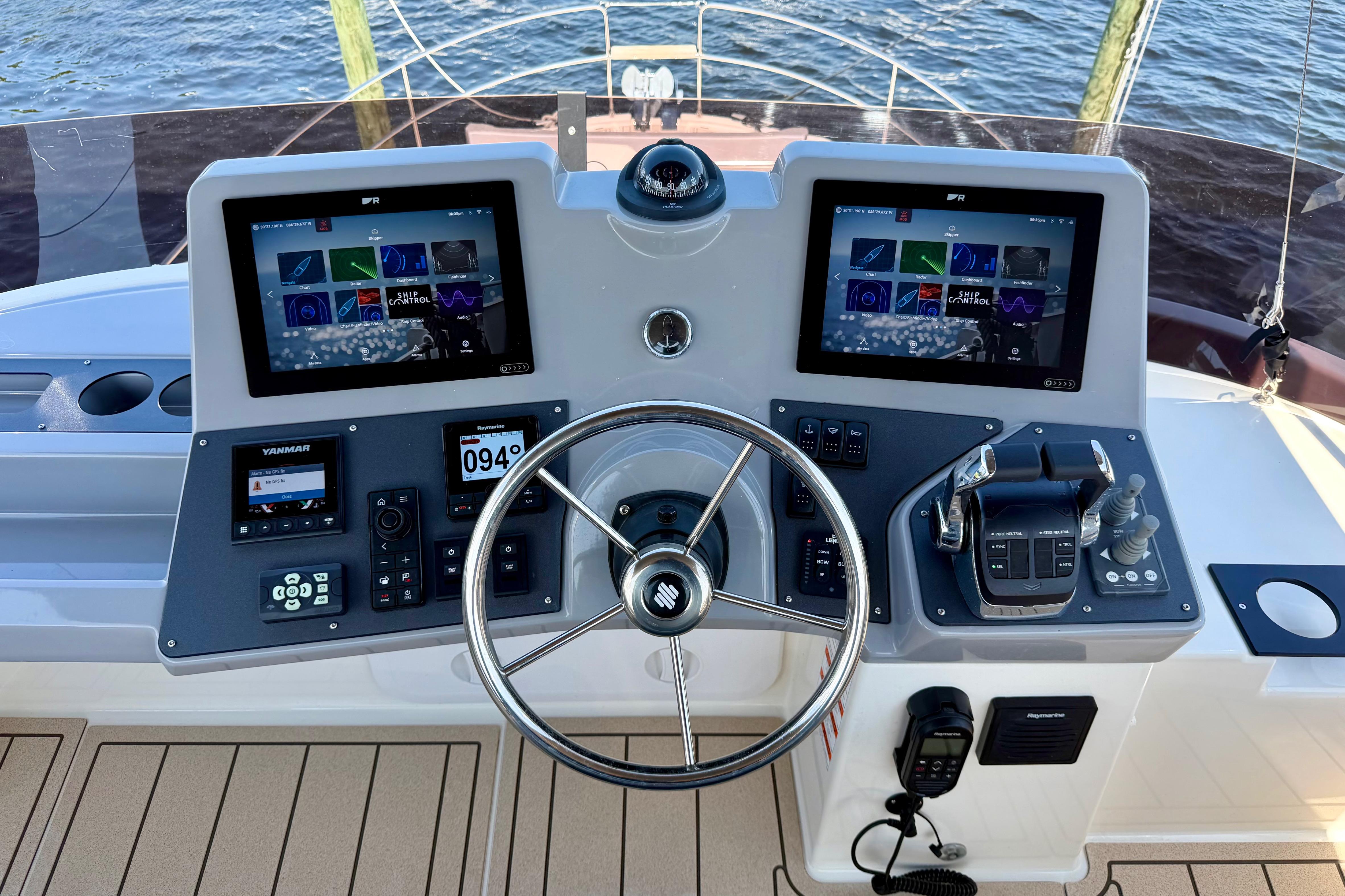 Helm of 2025 Beneteau Swift Trawler 41 Fly with dual screens and controls.