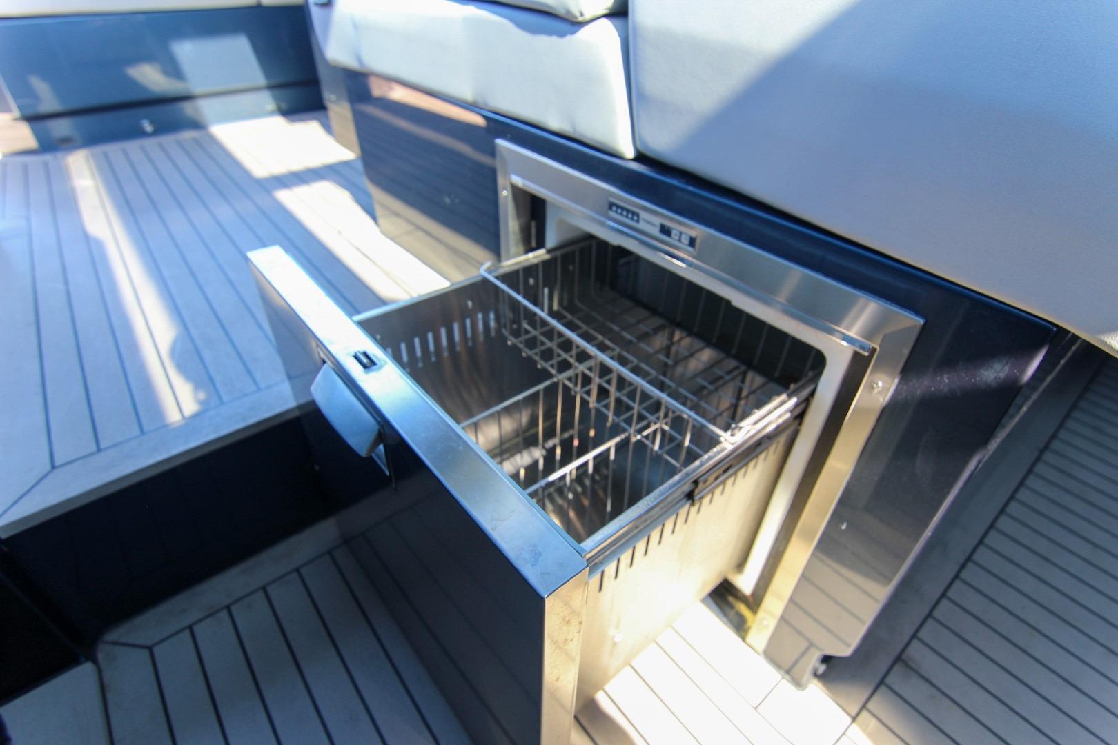 Built-in drawer refrigerator on 2022 Vanquish Yachts VQ45, featuring sleek design and spacious interior.