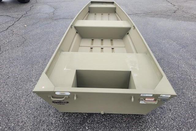 2026 Tracker Grizzly 14 Jon boat on asphalt surface, showcasing interior layout.