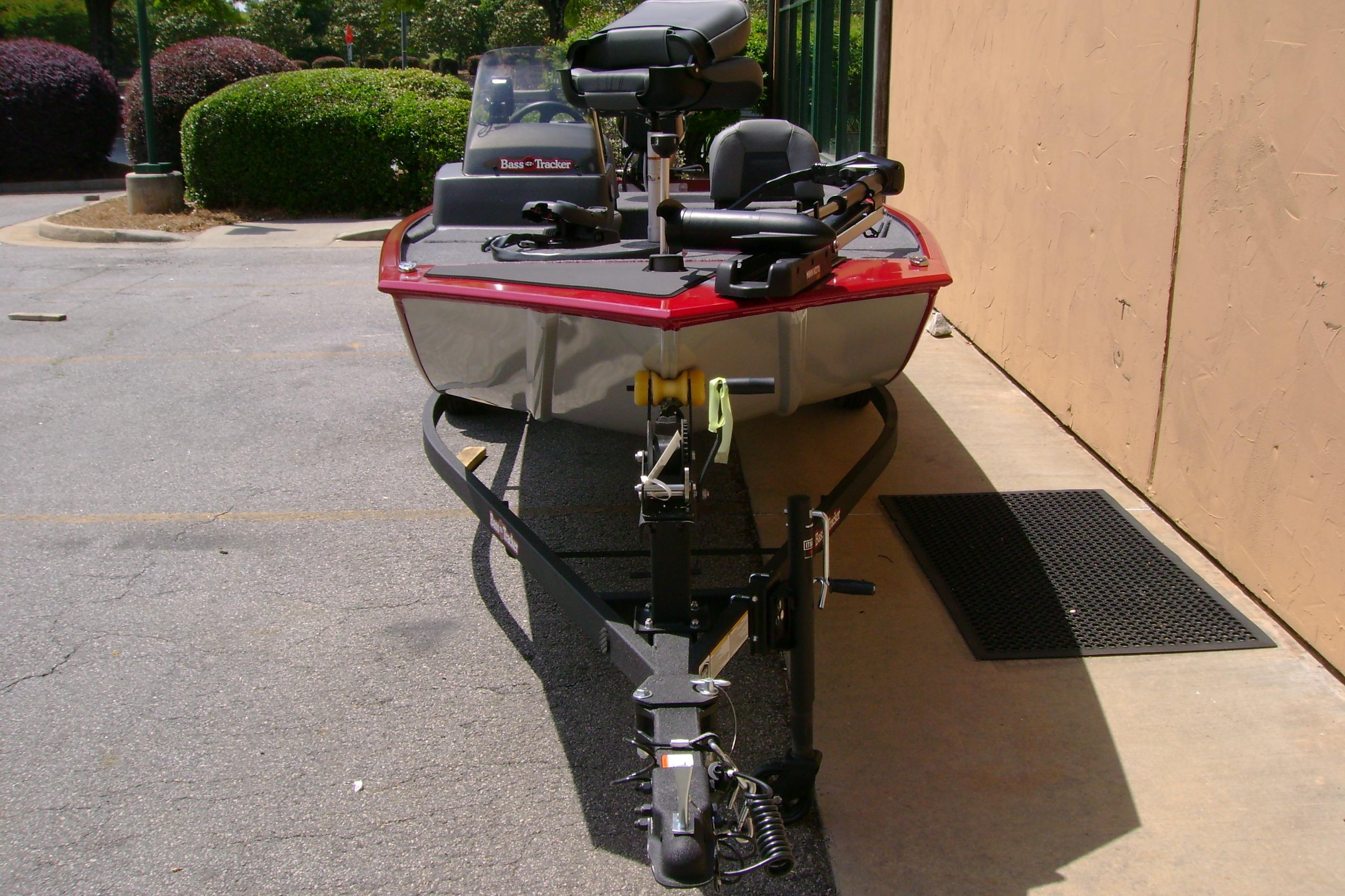 2026 Tracker Bass Tracker Classic XL boat on trailer, parked outdoors.