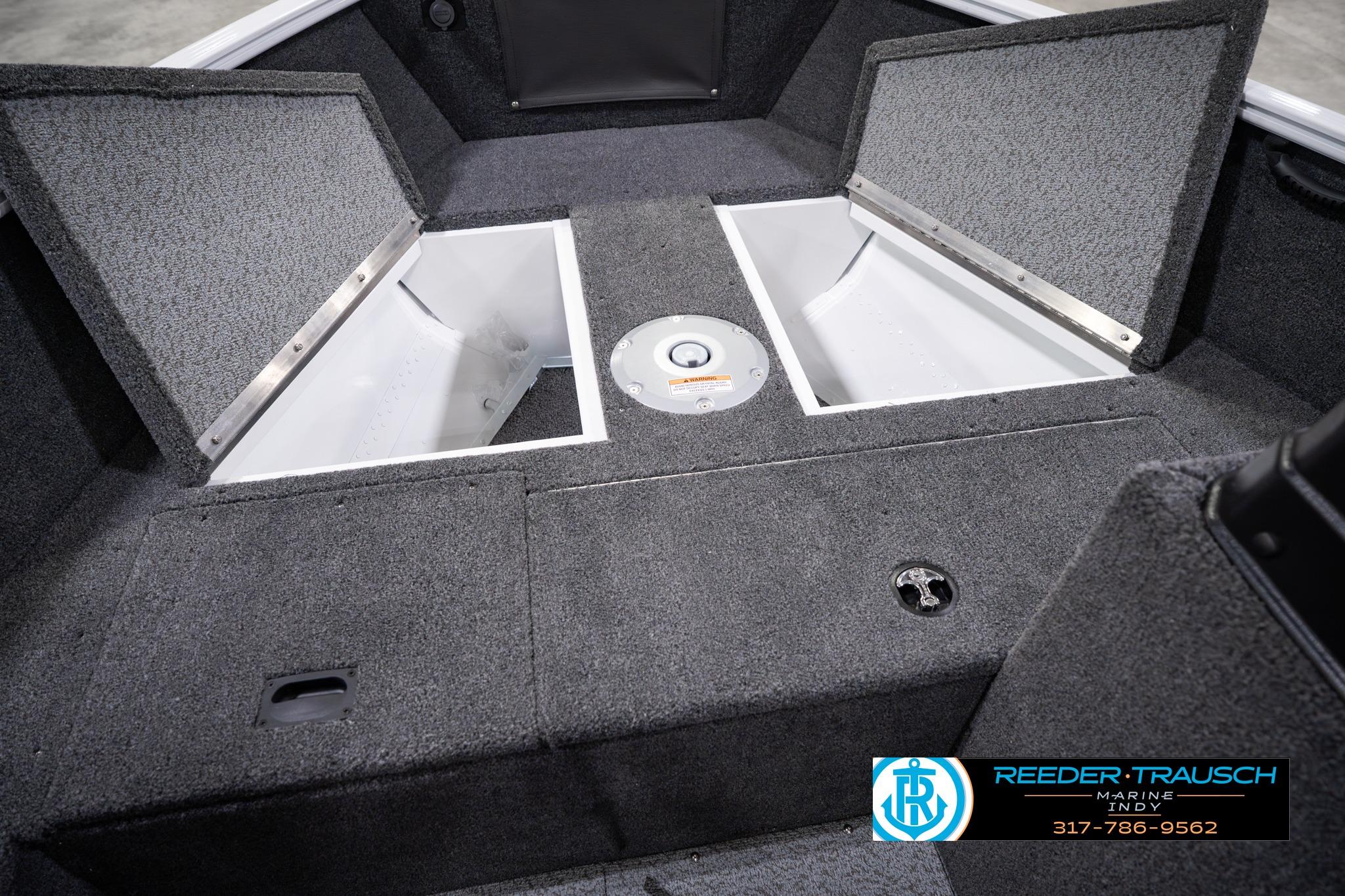 2026 Lund 1650 Rebel XL SS boat interior with open storage compartments.