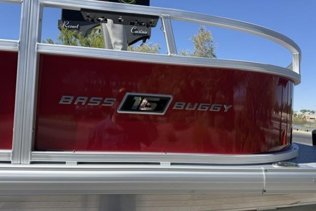 2026 Sun Tracker Bass Buggy 16 XL Select pontoon boat, red exterior detail.
